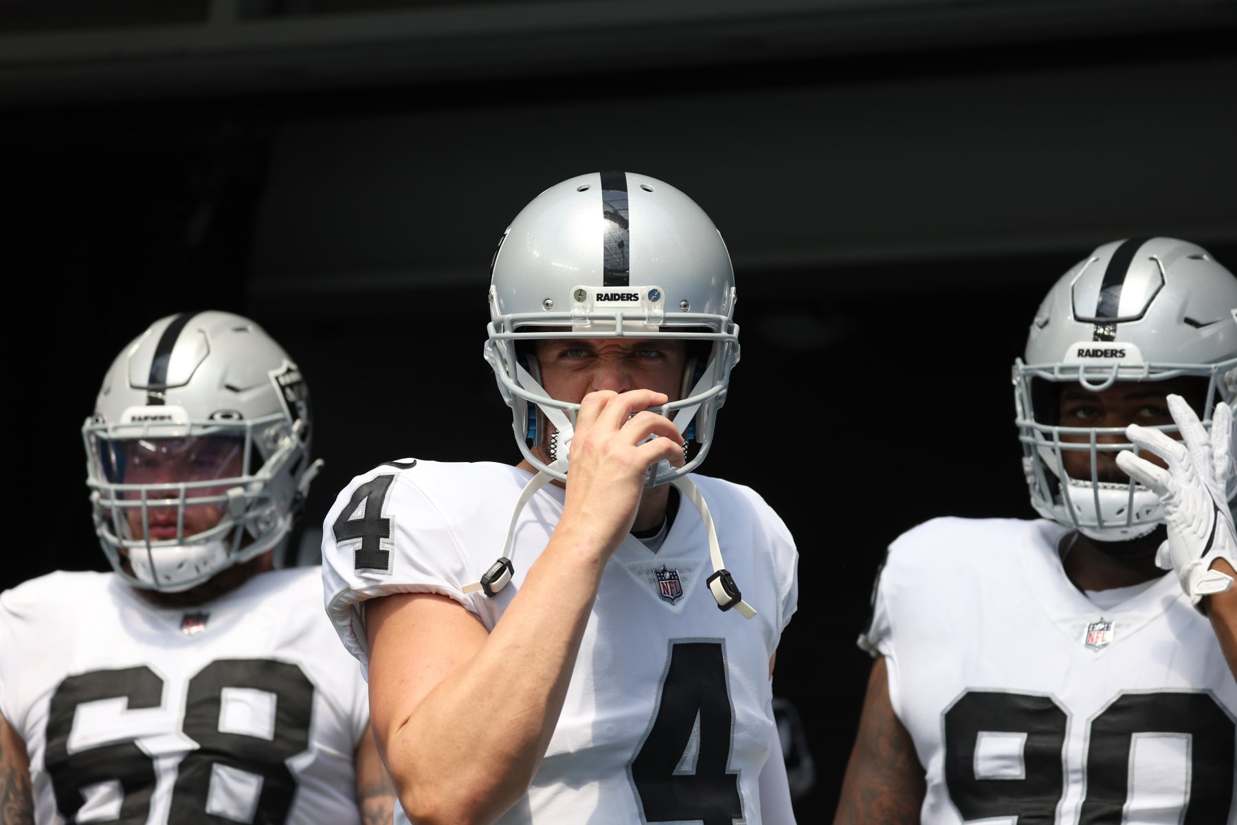 INGLEWOOD, CALIFORNIA - SEPTEMBER 11: Derek Carr #4 of the Las Vegas Raiders prepares to lead his team onto the field before the game against the Los Angeles Chargers at SoFi Stadium on September 11, 2022 in Inglewood, California. (Photo by Harry How/Getty Images)