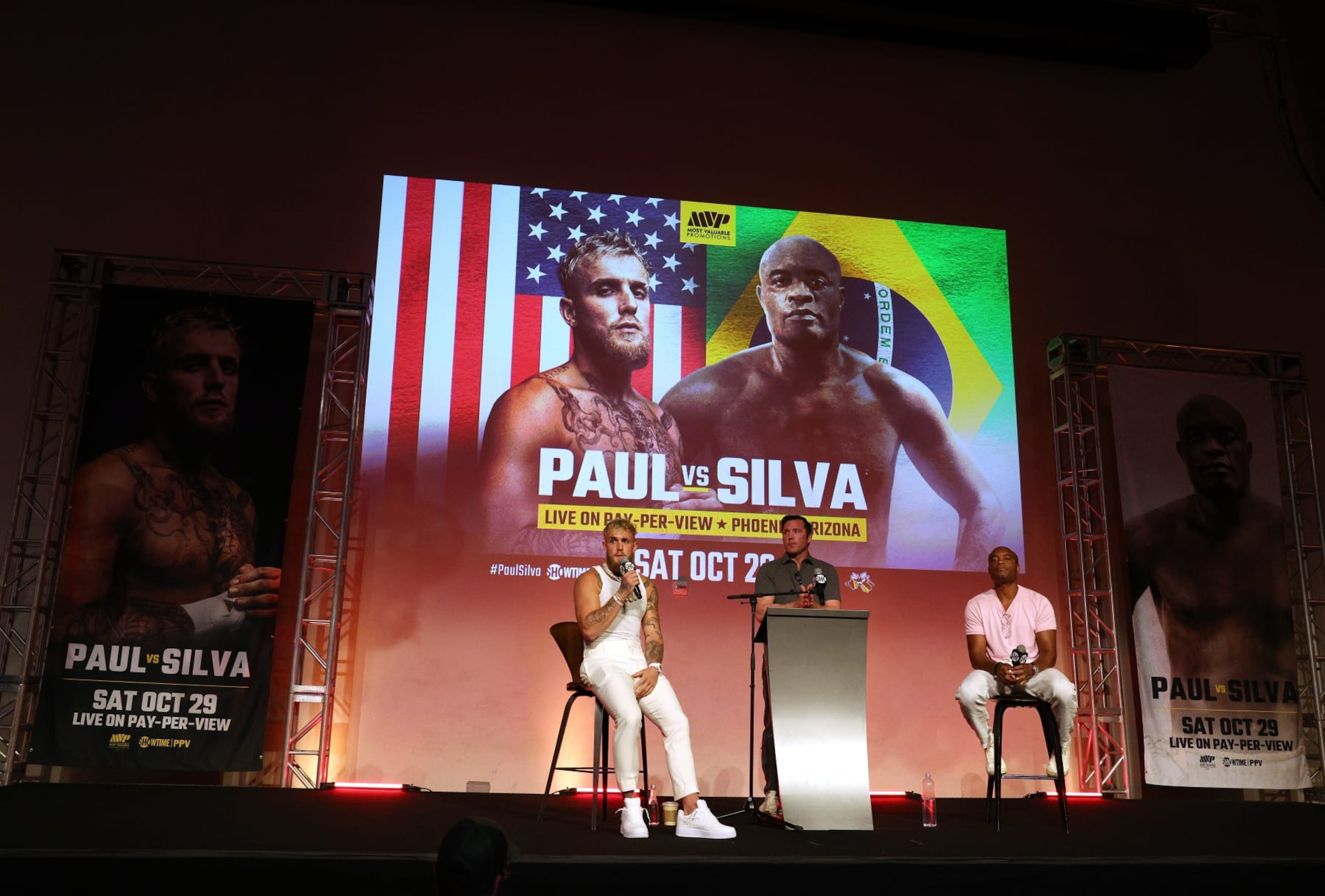 HOLLYWOOD, CALIFORNIA - SEPTEMBER 12: Jake Paul and Anderson SIlva with promoter Chael Sonnen during a Jake Paul v Anderson Silva press conference at NeueHouse Hollywood on September 12, 2022 in Hollywood, California. (Photo by Harry How/Getty Images)