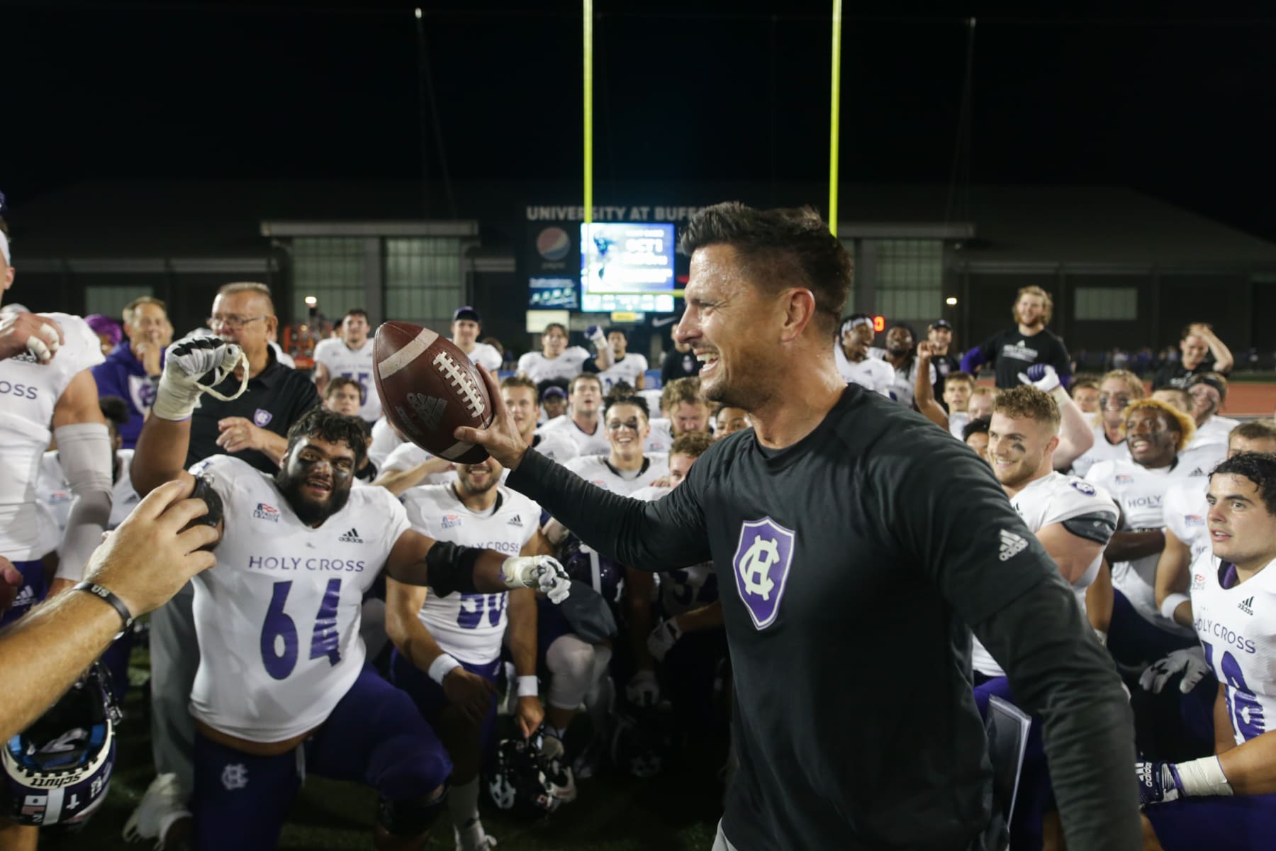 AMHERST, NY - SEPTEMBER 10: Holy Cross Crusaders head coach Bob Chesney speaks with players after a college football game between the Holy Cross Crusaders and the Buffalo Bulls on September 10, 2022, at UB Stadium in Amherst, NY. (Photo by Joshua Bessex/Icon Sportswire via Getty Images)