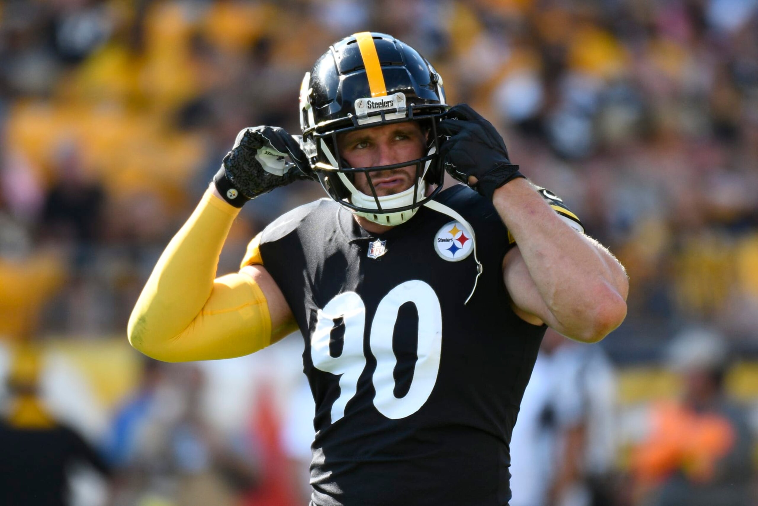 Pittsburgh Steelers linebacker T.J. Watt (90) buckles his helmet as he prepares to play against the Detroit Lions during the first half of an NFL preseason football game, Sunday, Aug. 28, 2022, in Pittsburgh. (AP Photo/Don Wright) Pittsburgh Steelers linebacker T.J. Watt (90) buckles his helmet as he prepares to play against the Detroit Lions during the first half of an NFL preseason football game, Sunday, Aug. 28, 2022, in Pittsburgh. (AP Photo/Don Wright)
