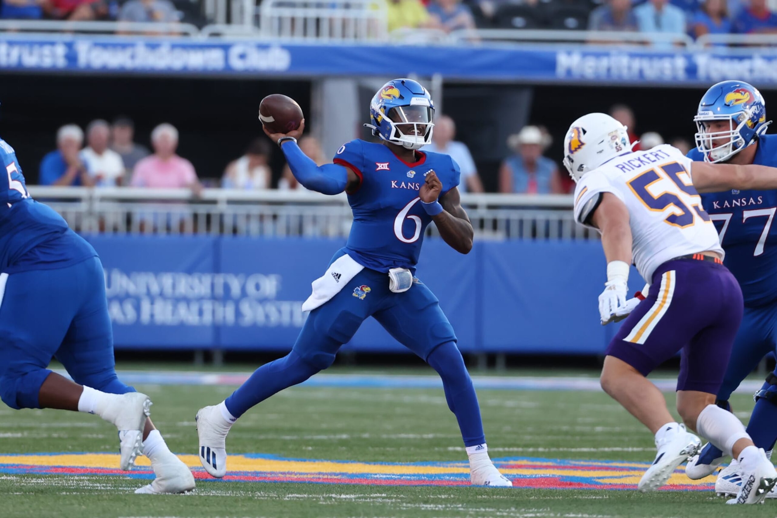 LAWRENCE, KS - SEPTEMBER 02: Kansas Jayhawks quarterback Jalon Daniels (6) makes a throw in the first quarter of a college football game between the Tennessee Tech Golden Eagles and Kansas Jayhawks on September 2, 2022 at Memorial Stadium in Lawrence, KS.  Photo by Scott Winters/Icon Sportswire via Getty Images)