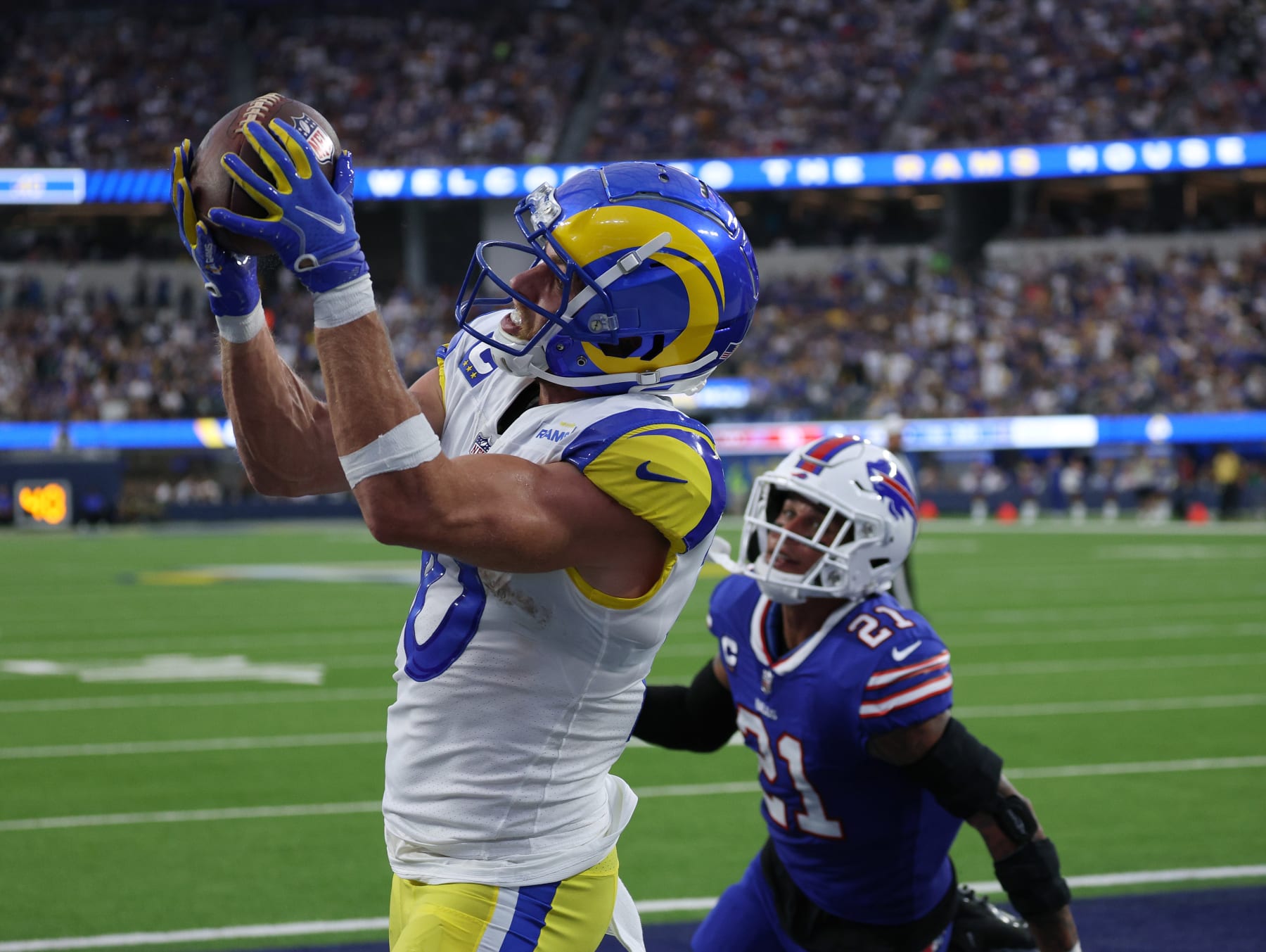 INGLEWOOD, CALIFORNIA - SEPTEMBER 08: Cooper Kupp #10 of the Los Angeles Rams makes a catch for a touchdown in front of Jordan Poyer #21 of the Buffalo Bills, to trail 10-7, during the 2022 NFL season opening game at SoFi Stadium on September 08, 2022 in Inglewood, California. (Photo by Harry How/Getty Images)