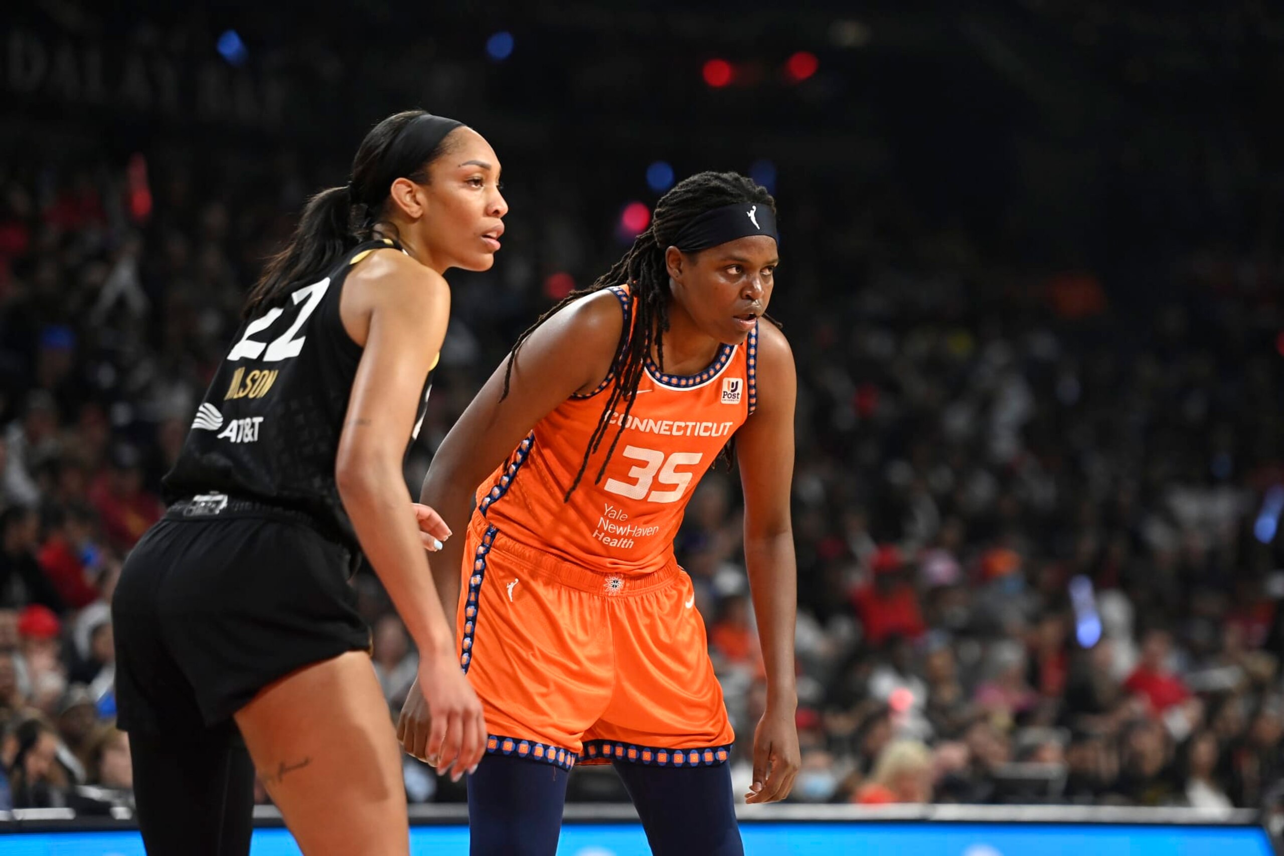 LAS VEGAS, NV - SEPTEMBER 11: Jonquel Jones #35 of the Connecticut Sun and Aja Wilson #22 of the Las Vegas Aces look on during Game 1 of the 2022 WNBA Finals on September 11, 2022 at  Michelob ULTRA Arena in Las Vegas, Nevada. NOTE TO USER: User expressly acknowledges and agrees that, by downloading and or using this photograph, User is consenting to the terms and conditions of the Getty Images License Agreement. Mandatory Copyright Notice: Copyright 2022 NBAE (Photo by David Becker/NBAE via Getty Images)