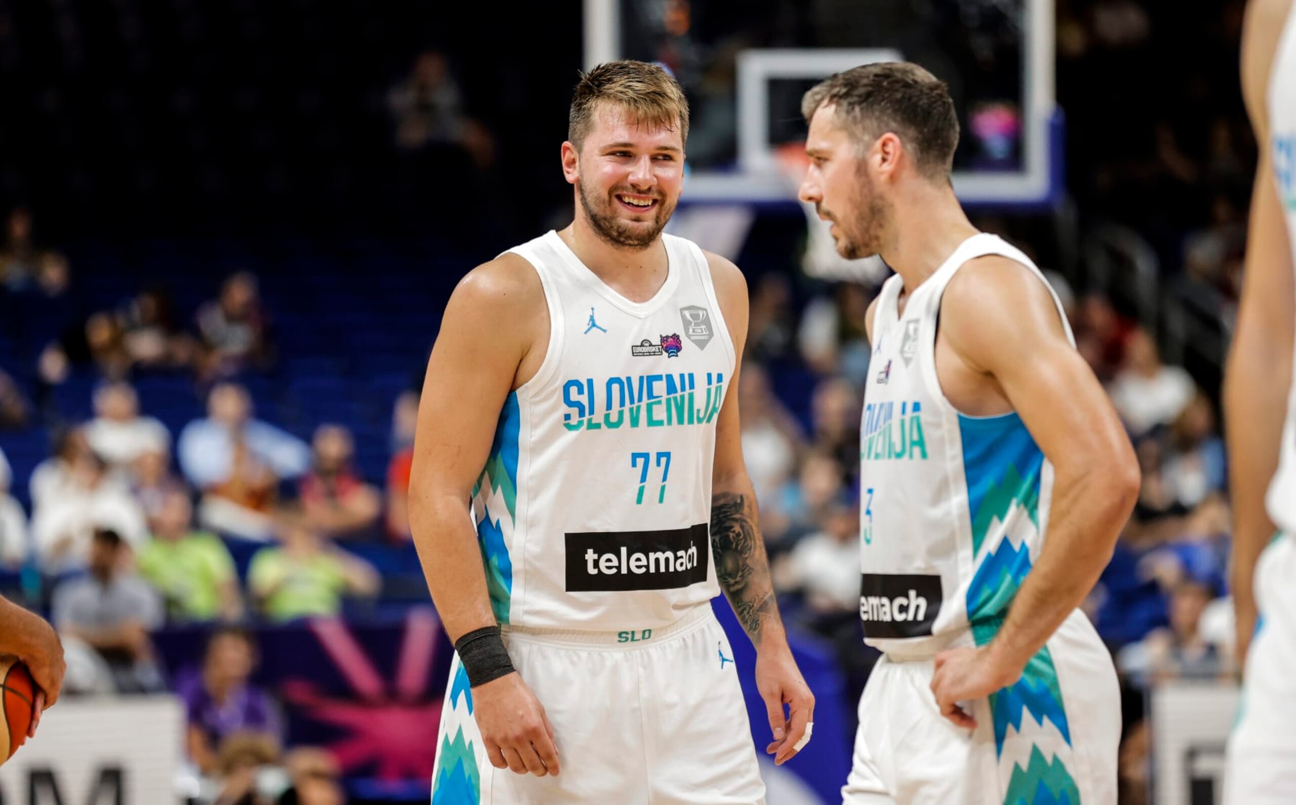 BERLIN, GERMANY - SEPTEMBER 10: Luka Doncic, Goran Dragic of Slovenia during the FIBA EuroBasket 2022 round of 16 match between Slovenia and Belgium at EuroBasket Arena Berlin on September 10, 2022 in Berlin, Germany. (Photo by Pedja Milosavljevic/DeFodi Images via Getty Images) BERLIN, GERMANY - SEPTEMBER 10: Luka Doncic, Goran Dragic of Slovenia during the FIBA EuroBasket 2022 round of 16 match between Slovenia and Belgium at EuroBasket Arena Berlin on September 10, 2022 in Berlin, Germany. (Photo by Pedja Milosavljevic/DeFodi Images via Getty Images)