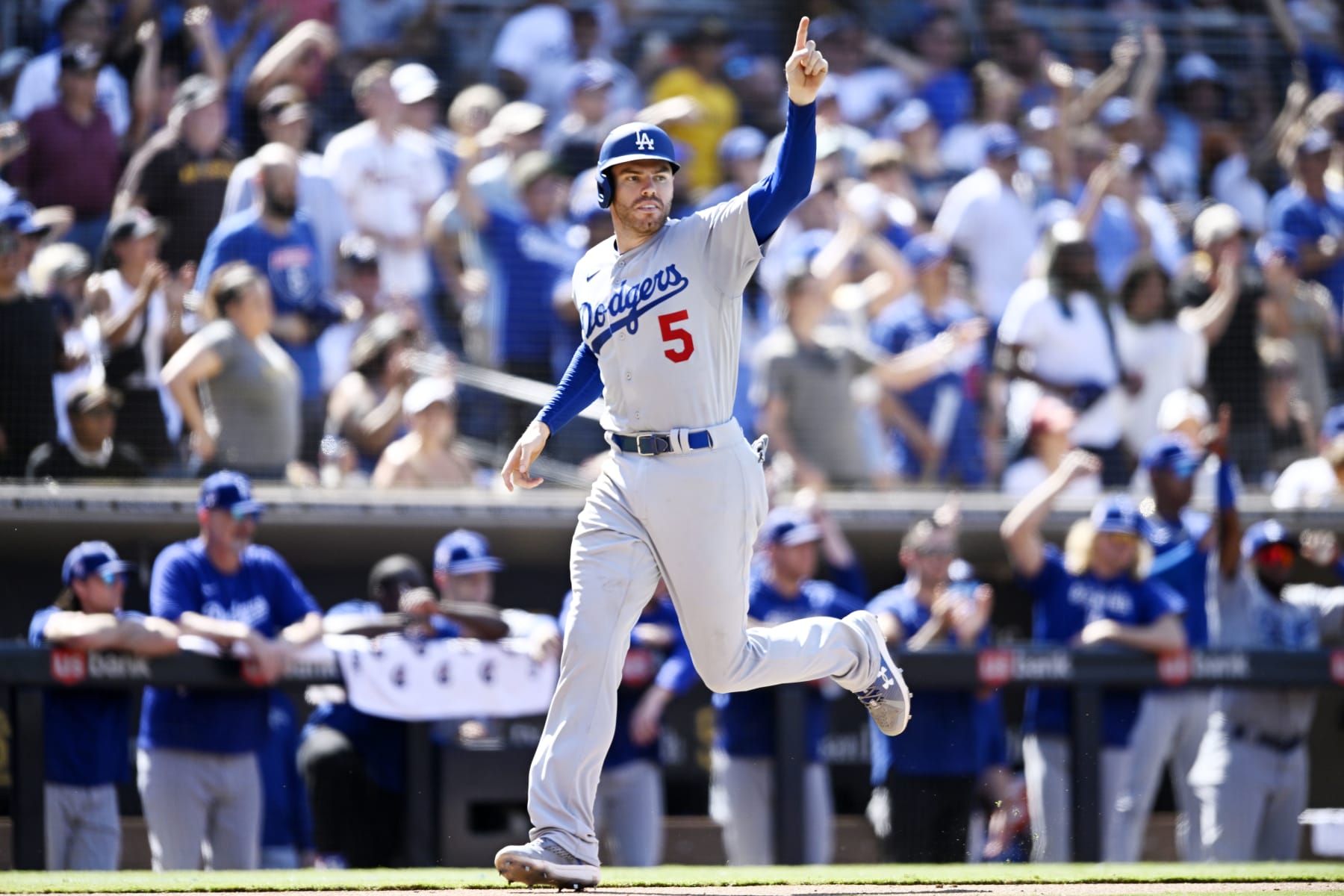 SAN DIEGO, CA - SEPTEMBER 11: Freddie Freeman #5 of the Los Angeles Dodgers celebrates as he scores during the sixth inning of a baseball game against the San Diego Padres September 11, 2022 at Petco Park in San Diego, California. (Photo by Denis Poroy/Getty Images)