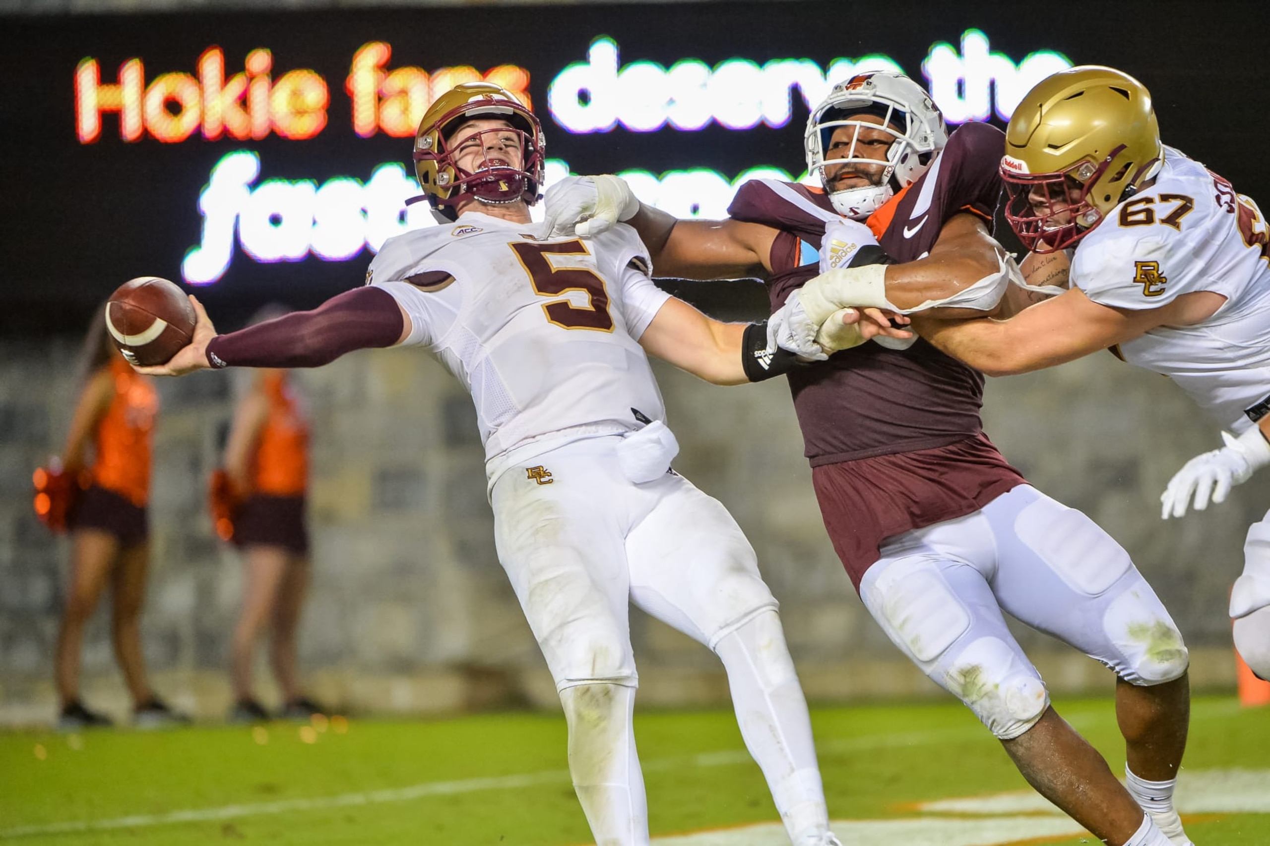 BLACKSBURG, VA - SEPTEMBER 10:  Virginia Tech Hokies defensive lineman TyJuan Garbutt (45) hurries the Boston College Eagles quarterback Phil Jurkovec (5) during the Virginia Tech Hokies game versus the Boston College Eagles on September 10, 2022, at Lane Stadium in Blacksburg, VA. (Photo by Brian Bishop/Icon Sportswire via Getty Images)
