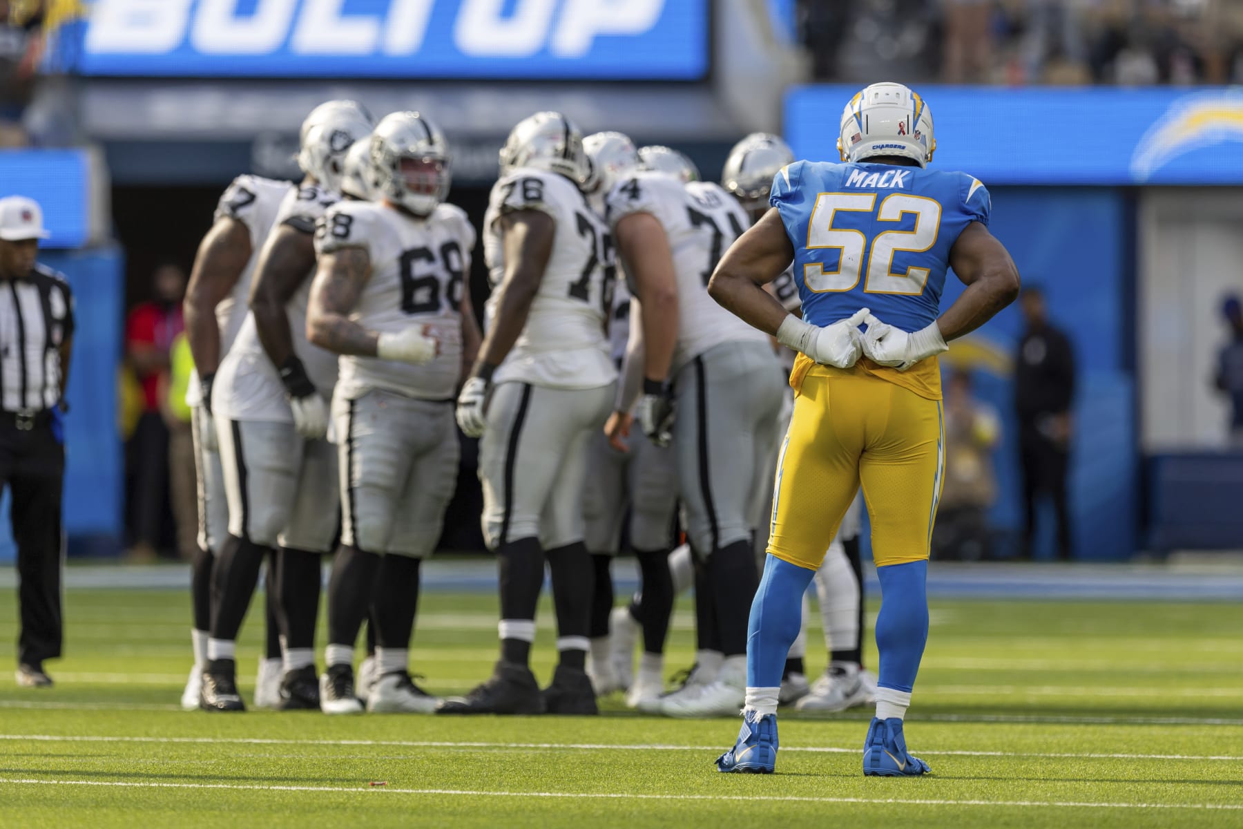 Linebacker (52) Khalil Mack of the Los Angeles Chargers waits for the Las Vegas Raiders to break huddle in an NFL football game, Sunday, Sept. 11, 2022, in Inglewood, Calif. Chargers won 24-19. (AP Photo/Jeff Lewis)