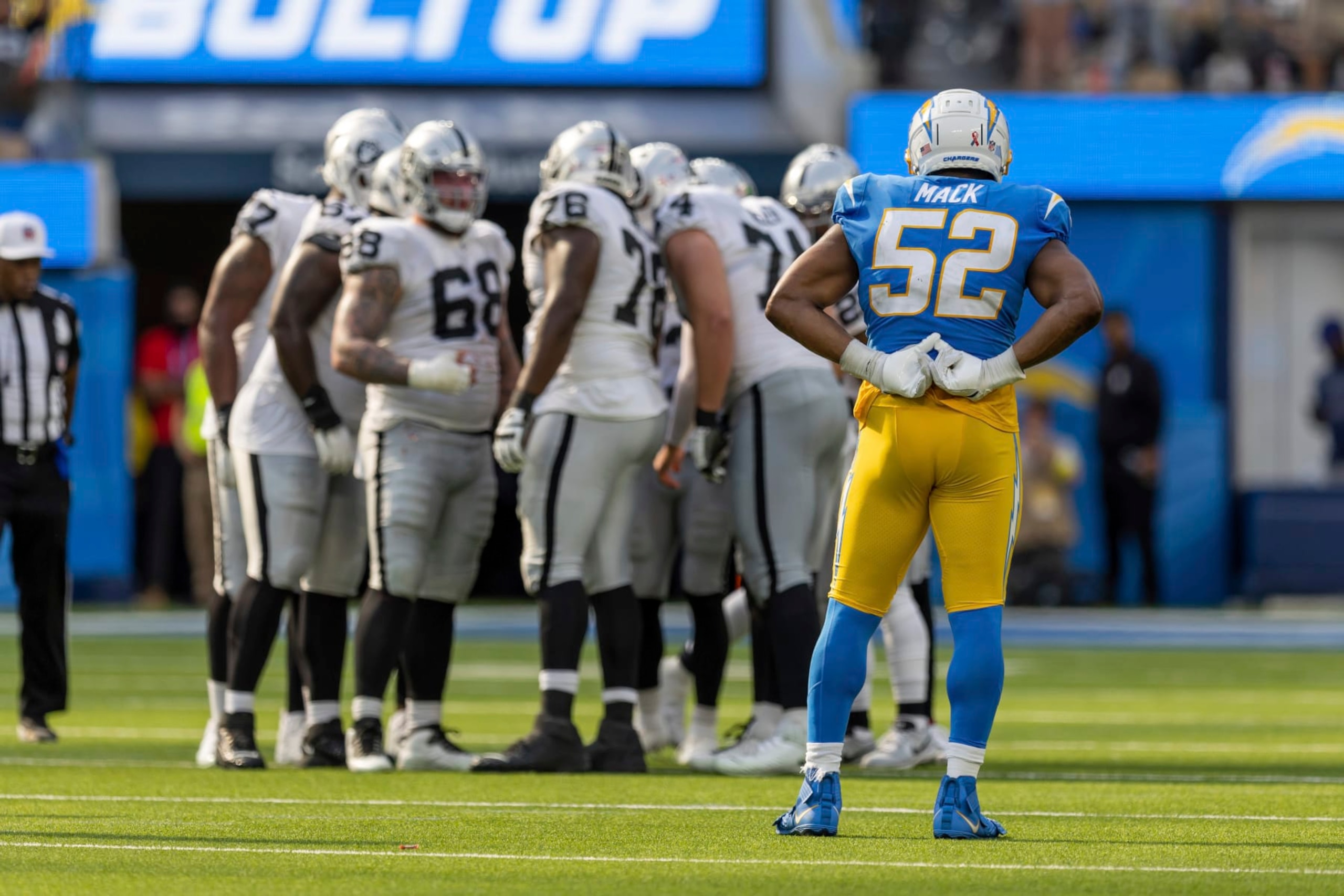 Linebacker (52) Khalil Mack of the Los Angeles Chargers waits for the Las Vegas Raiders to break huddle in an NFL football game, Sunday, Sept. 11, 2022, in Inglewood, Calif. Chargers won 24-19. (AP Photo/Jeff Lewis)