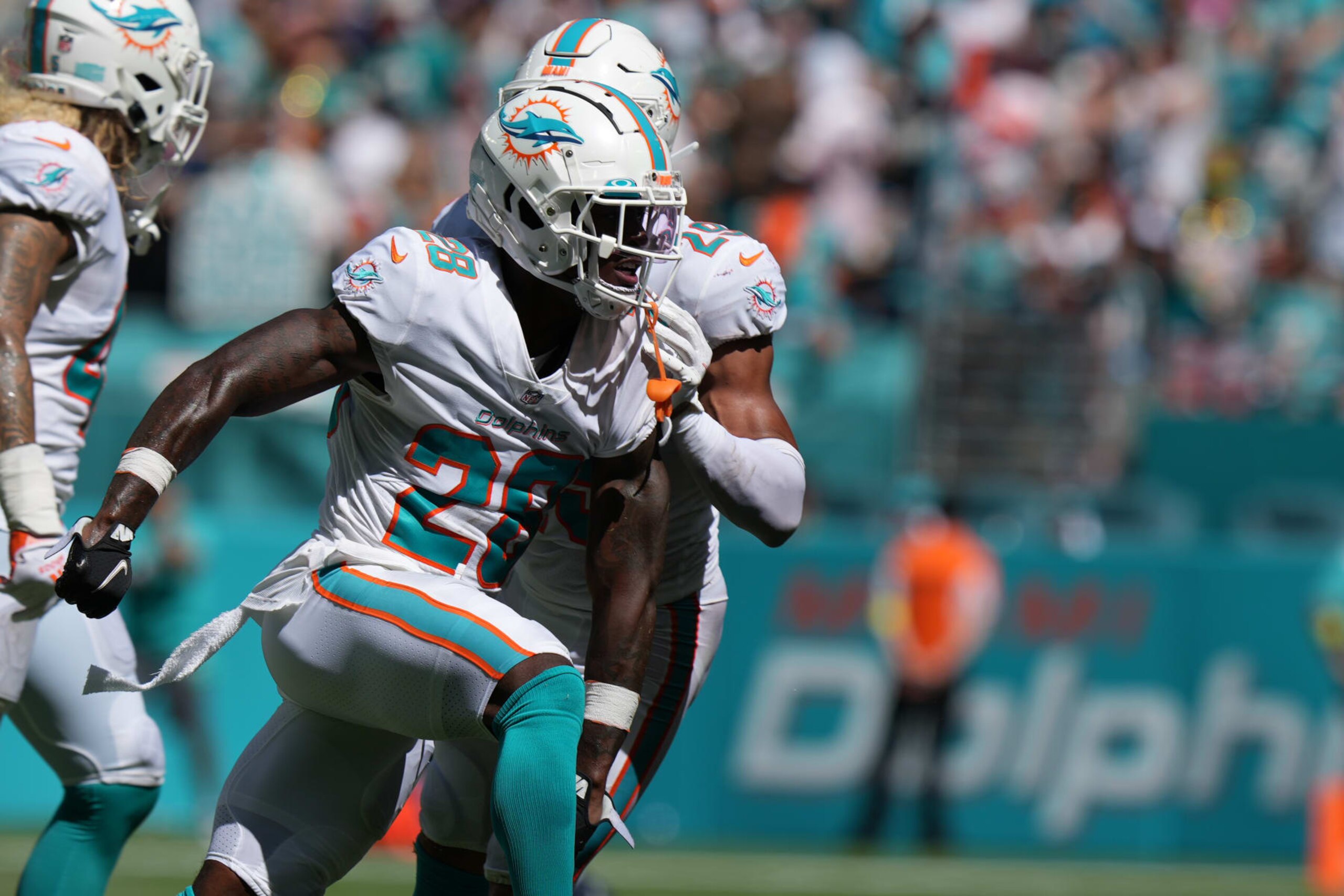 MIAMI GARDENS, FL - SEPTEMBER 11: Miami Dolphins cornerback Kader Kohou (28) runs in celebration after a defensive play during the game between the New England Patriots  and the Miami Dolphins, on Sunday, September 11, 2022 at Hard Rock Stadium in Miami Gardens, FL (Photo by Peter Joneleit/Icon Sportswire via Getty Images)