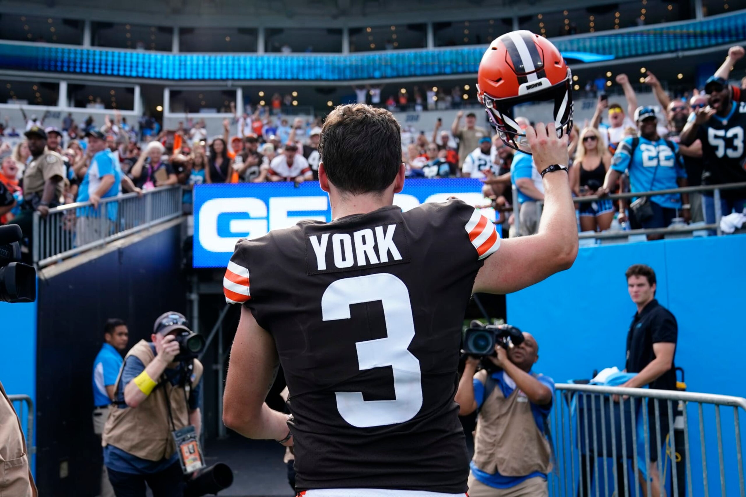 Cleveland Browns place kicker Cade York waves as he leaves the field after their win against the Carolina Panthers an NFL football game on Sunday, Sept. 11, 2022, in Charlotte, N.C. York kicked the game winning field goal. (AP Photo/Jacob Kupferman)