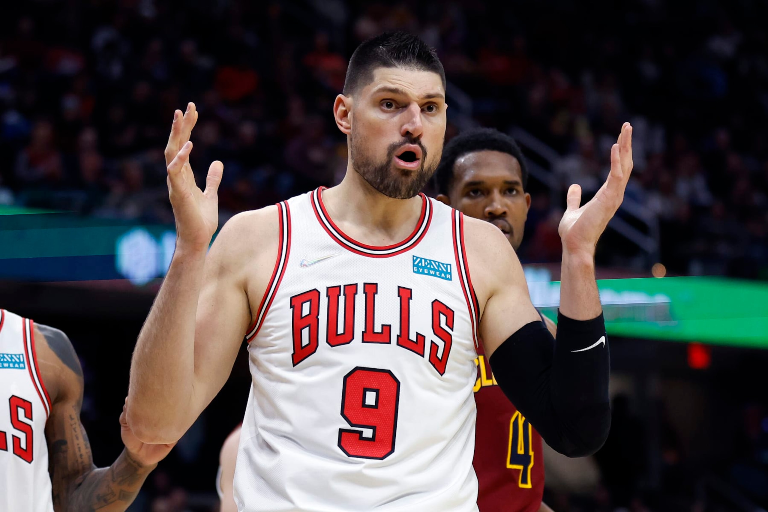 Chicago Bulls' Nikola Vucevic (9) reacts to a call during the second half of an NBA basketball game against the Cleveland Cavaliers, Saturday, March 26, 2022, in Cleveland. (AP Photo/Ron Schwane)