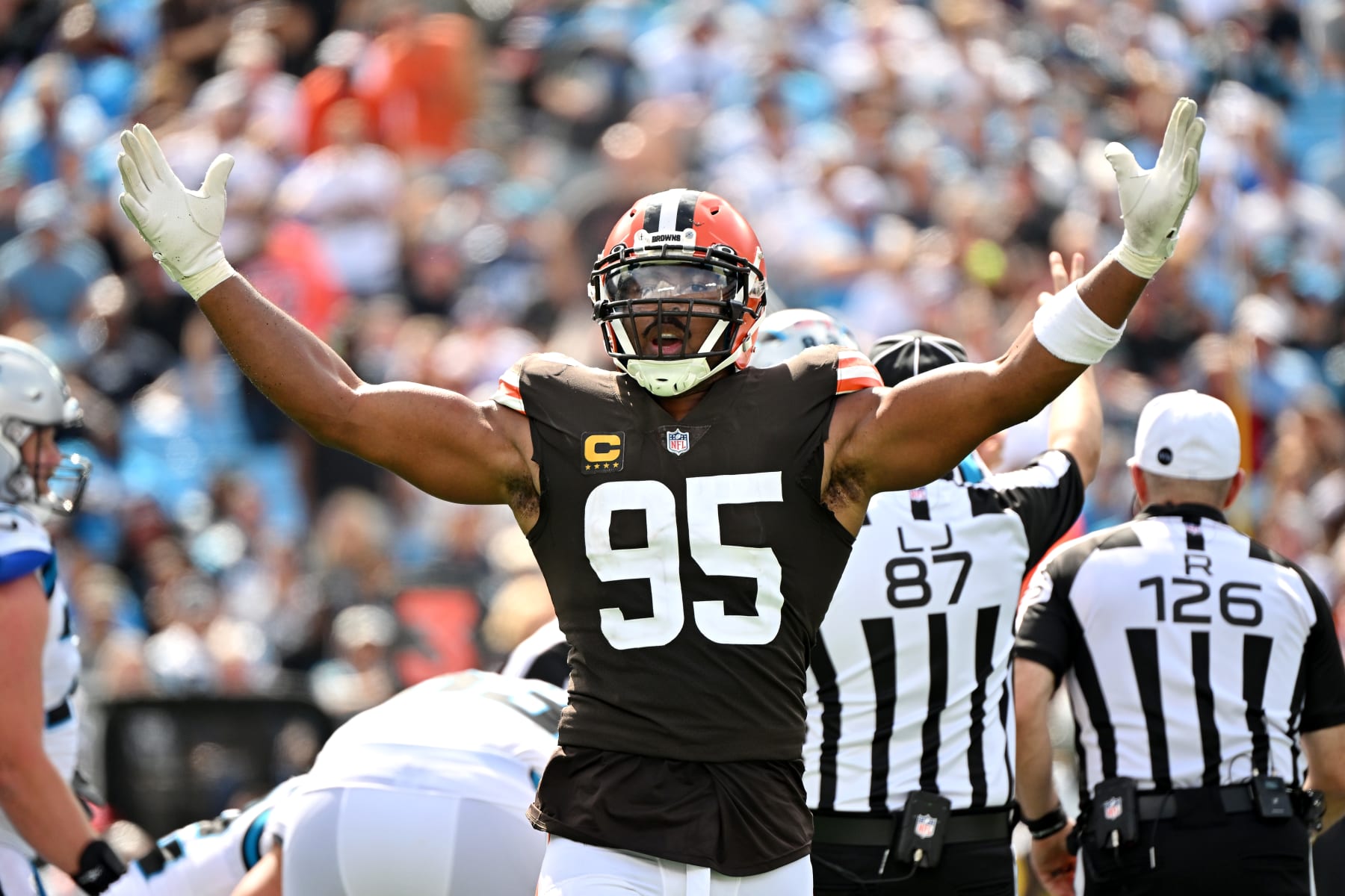 CHARLOTTE, NORTH CAROLINA - SEPTEMBER 11: Myles Garrett #95 of the Cleveland Browns reacts after sacking Baker Mayfield #6 of the Carolina Panthers during the third quarter at Bank of America Stadium on September 11, 2022 in Charlotte, North Carolina. (Photo by Grant Halverson/Getty Images)