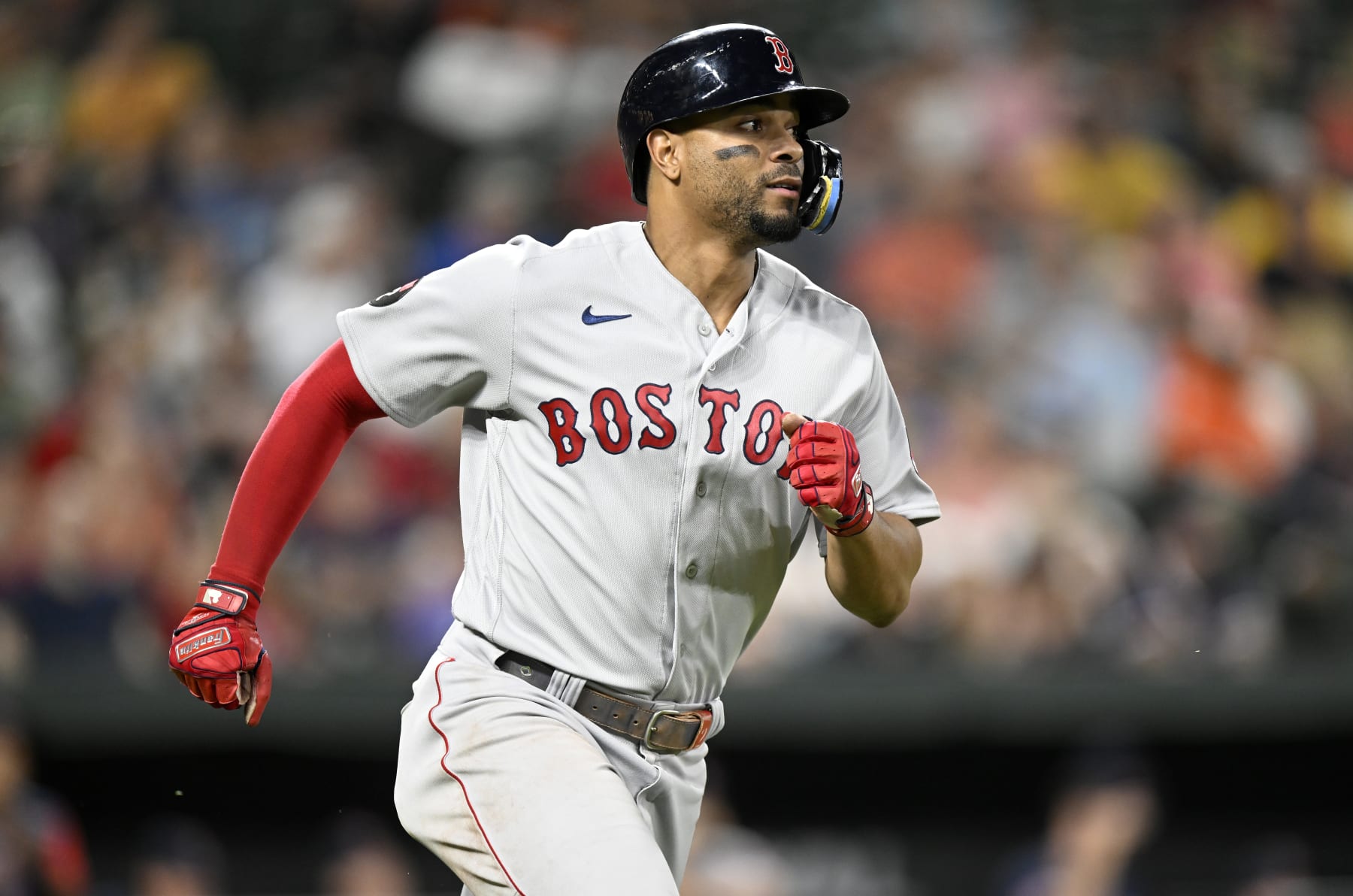 BALTIMORE, MARYLAND - SEPTEMBER 09: Xander Bogaerts #2 of the Boston Red Sox runs to first base against the Baltimore Orioles at Oriole Park at Camden Yards on September 09, 2022 in Baltimore, Maryland. (Photo by G Fiume/Getty Images)