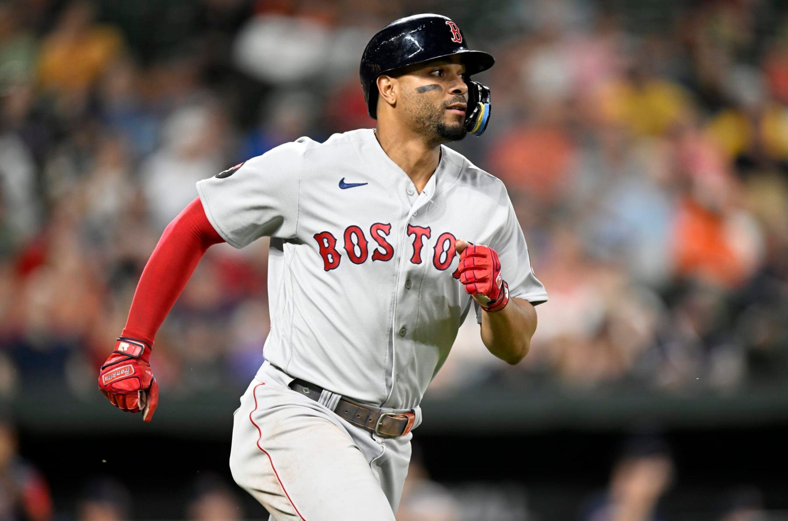 BALTIMORE, MARYLAND - SEPTEMBER 09: Xander Bogaerts #2 of the Boston Red Sox runs to first base against the Baltimore Orioles at Oriole Park at Camden Yards on September 09, 2022 in Baltimore, Maryland. (Photo by G Fiume/Getty Images)