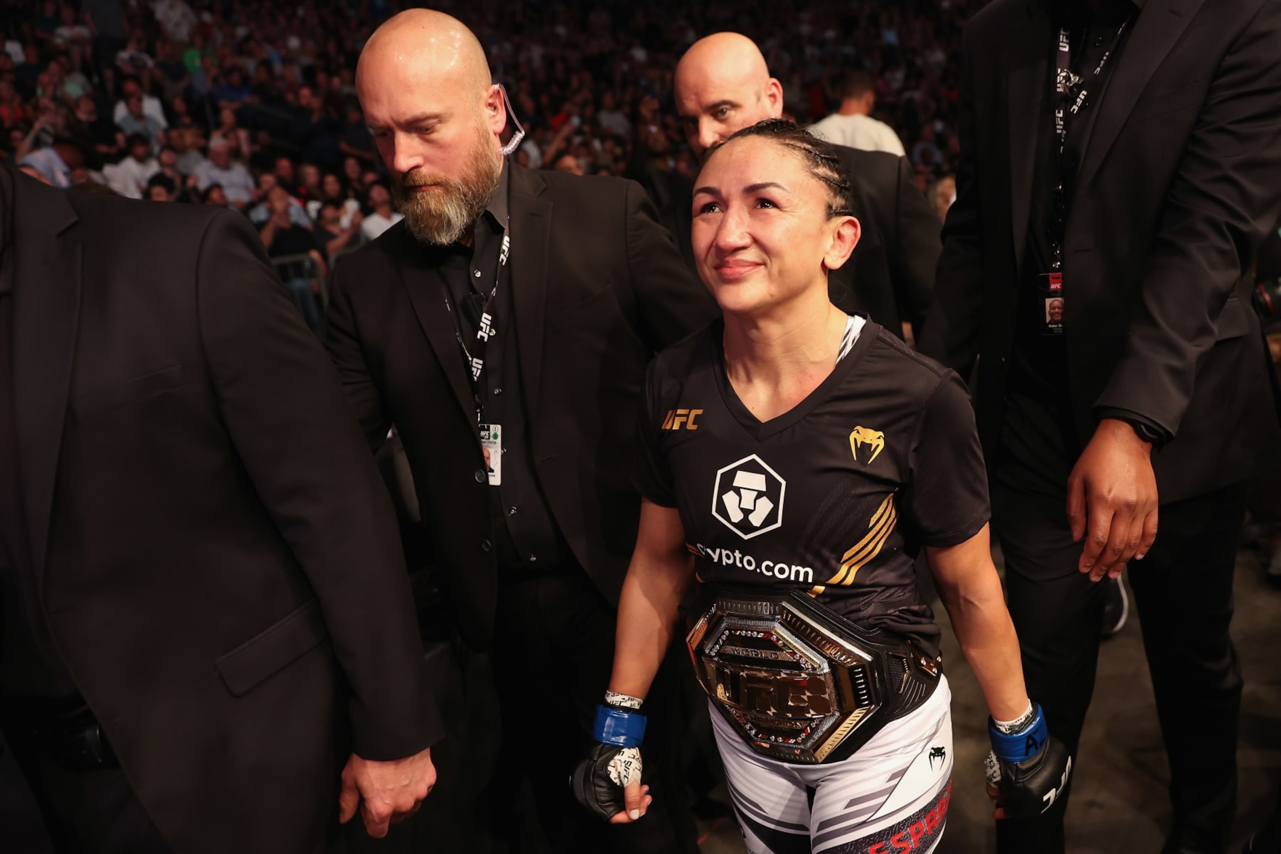 PHOENIX, ARIZONA - MAY 07: Carla Esparza reacts after her victory over Rose Namajunas in their women’s strawweight championship bout during UFC 274 at Footprint Center on May 07, 2022 in Phoenix, Arizona. (Photo by Christian Petersen/Getty Images)
