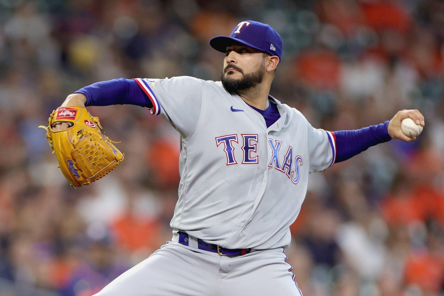 HOUSTON, TEXAS - SEPTEMBER 05: Martin Perez #54 of the Texas Rangers delivers during the second inning against the Houston Astros at Minute Maid Park on September 05, 2022 in Houston, Texas. (Photo by Carmen Mandato/Getty Images)
