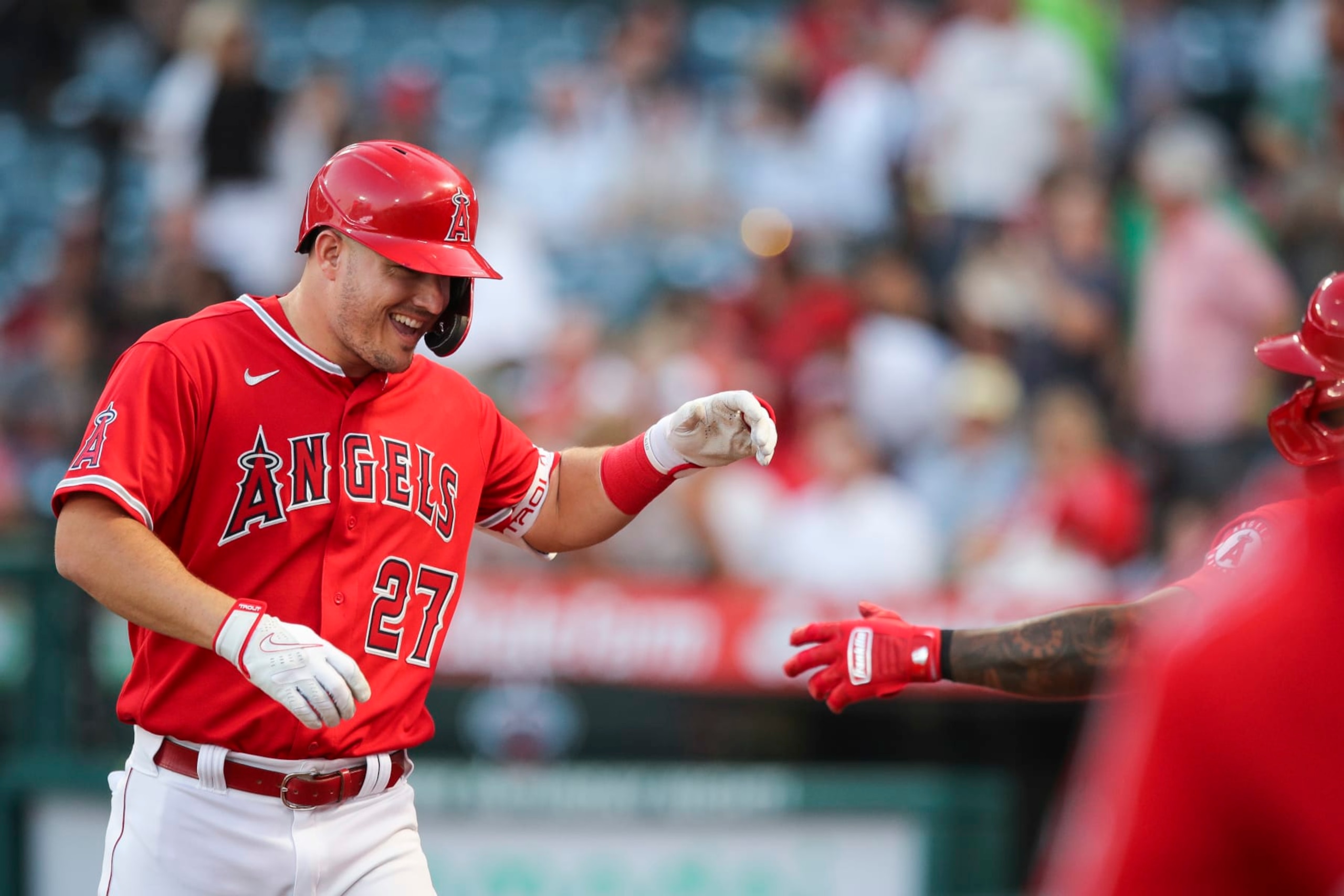 ANAHEIM, CALIFORNIA - SEPTEMBER 06: Mike Trout #27 of the Los Angeles Angels celebrates after hitting a home run in the first inning against the Detroit Tigers at Angel Stadium of Anaheim on September 06, 2022 in Anaheim, California. (Photo by Meg Oliphant/Getty Images) ANAHEIM, CALIFORNIA - SEPTEMBER 06: Mike Trout #27 of the Los Angeles Angels celebrates after hitting a home run in the first inning against the Detroit Tigers at Angel Stadium of Anaheim on September 06, 2022 in Anaheim, California. (Photo by Meg Oliphant/Getty Images)