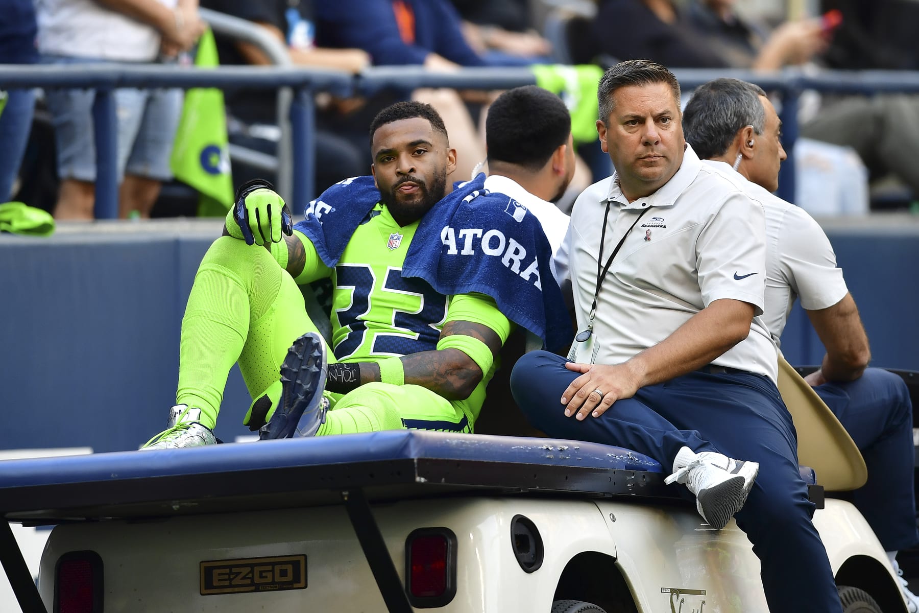 SEATTLE, WASHINGTON - SEPTEMBER 12: Jamal Adams #33 of the Seattle Seahawks is carted off the field during the second quarter against the Denver Broncos at Lumen Field on September 12, 2022 in Seattle, Washington. (Photo by Jane Gershovich/Getty Images)