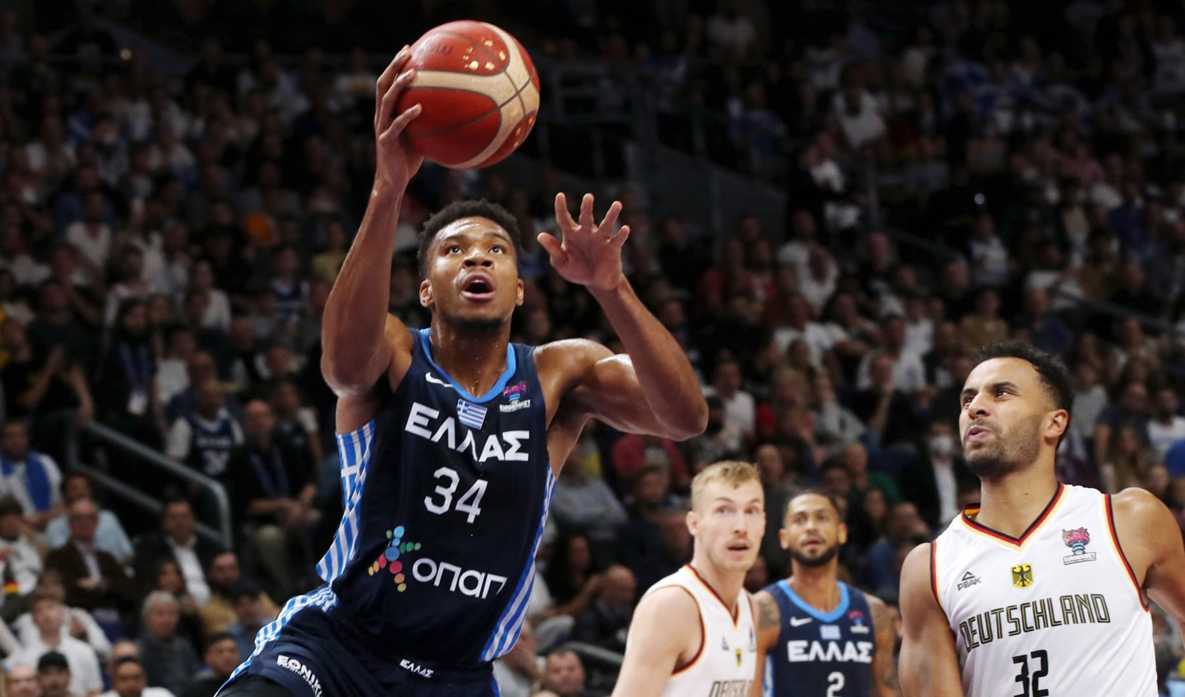 Greece's Giannis Antetokounmpo plays the ball during the FIBA Eurobasket 2022 Quarter Final basketball match between Germany and Greece in Berlin, on September 13, 2022. (Photo by Oliver Behrendt / AFP) (Photo by OLIVER BEHRENDT/AFP via Getty Images)