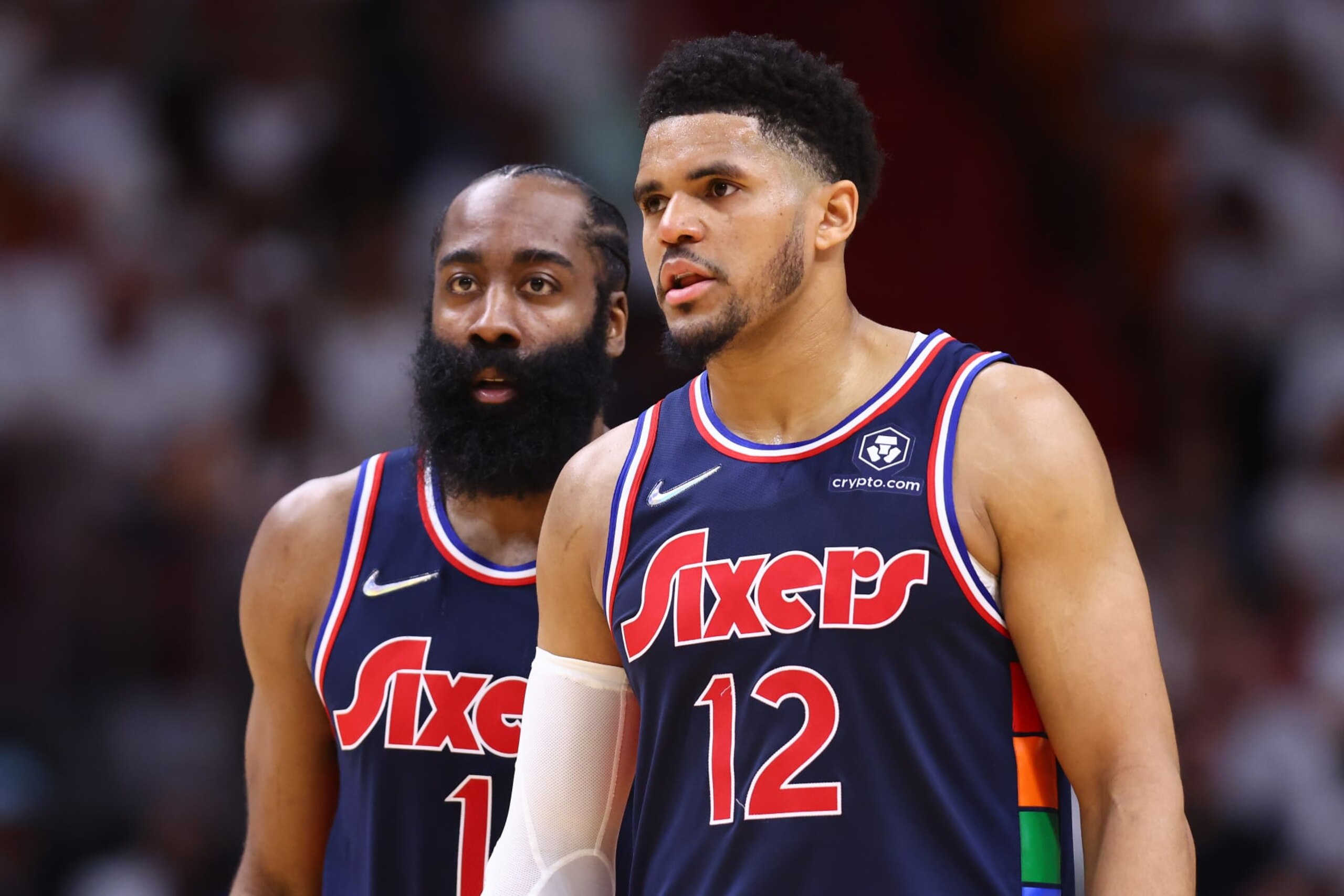MIAMI, FLORIDA - MAY 02: James Harden #1 and Tobias Harris #12 of the Philadelphia 76ers look on against the Miami Heat during the first half in Game One of the Eastern Conference Semifinals at FTX Arena on May 02, 2022 in Miami, Florida. NOTE TO USER: User expressly acknowledges and agrees that, by downloading and or using this photograph, User is consenting to the terms and conditions of the Getty Images License Agreement. (Photo by Michael Reaves/Getty Images)