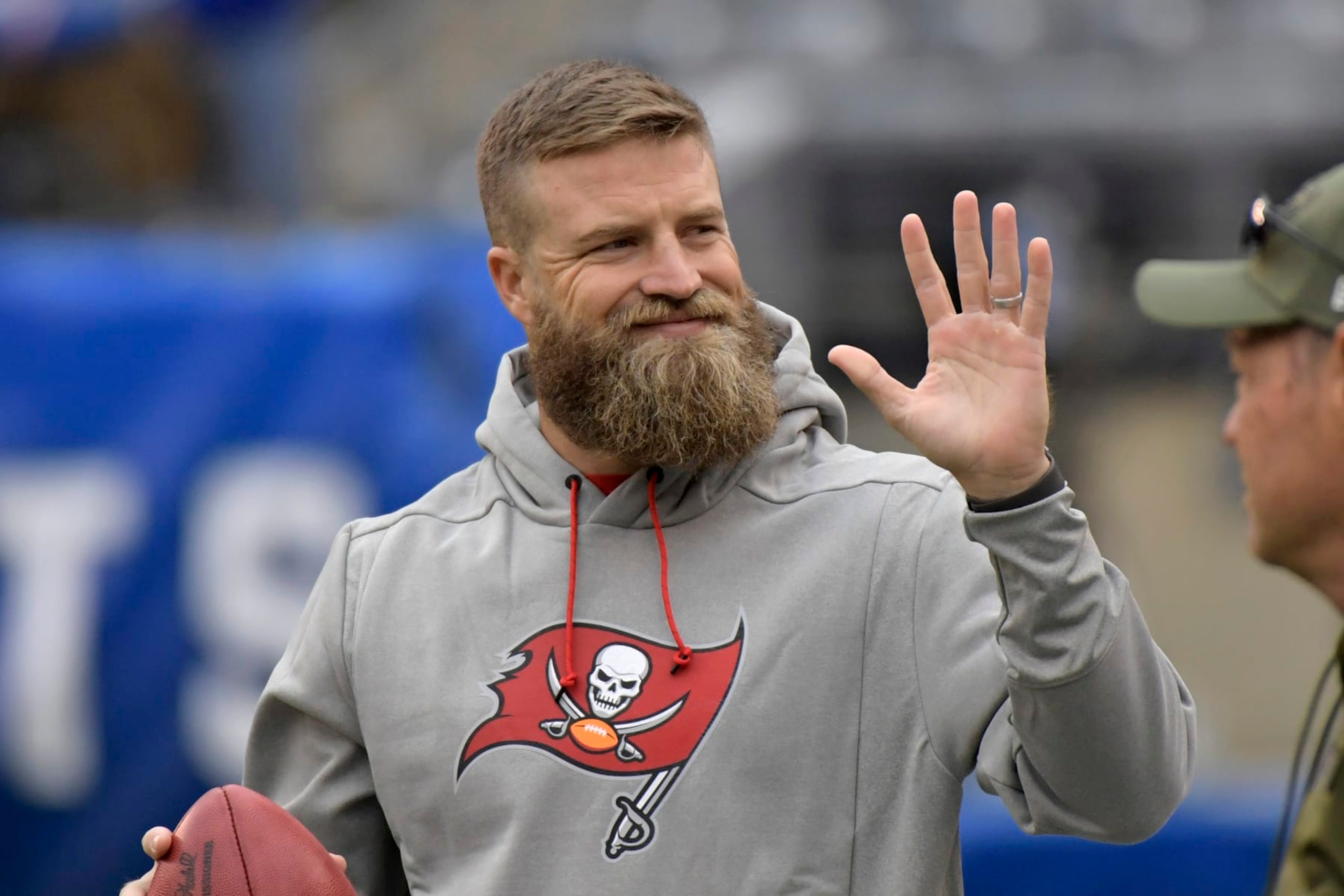 FILE - Tampa Bay Buccaneers quarterback Ryan Fitzpatrick waves to fans before an NFL football game against the New York Giants, Sunday, Nov. 18, 2018, in East Rutherford, N.J. Quarterback Ryan Fitzpatrick confirmed to The Associated Press on Friday, June 3, 2022, that he informed former teammates of his intention to retire a day earlier. Former Bills running back Fred Jackson first announced the news of Fitzpatrick’s retirement on his Twitter account by posting an image and message from his former Buffalo teammate. (AP Photo/Bill Kostroun, File) FILE - Tampa Bay Buccaneers quarterback Ryan Fitzpatrick waves to fans before an NFL football game against the New York Giants, Sunday, Nov. 18, 2018, in East Rutherford, N.J. Quarterback Ryan Fitzpatrick confirmed to The Associated Press on Friday, June 3, 2022, that he informed former teammates of his intention to retire a day earlier. Former Bills running back Fred Jackson first announced the news of Fitzpatrick’s retirement on his Twitter account by posting an image and message from his former Buffalo teammate. (AP Photo/Bill Kostroun, File)