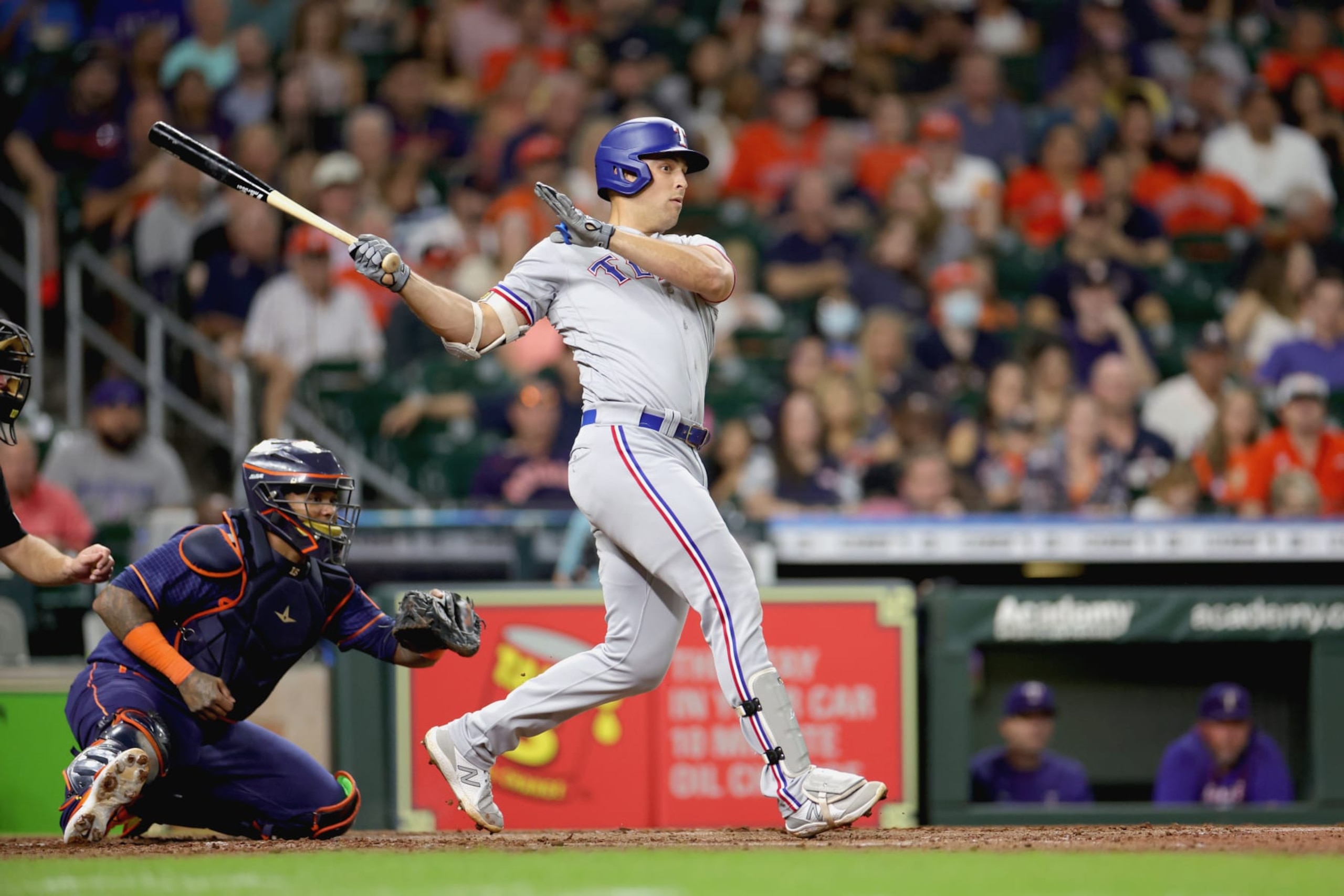 HOUSTON, TEXAS - SEPTEMBER 05: Nathaniel Lowe #30 of the Texas Rangers grounds out during the fourth inning against the Houston Astros at Minute Maid Park on September 05, 2022 in Houston, Texas. (Photo by Carmen Mandato/Getty Images)