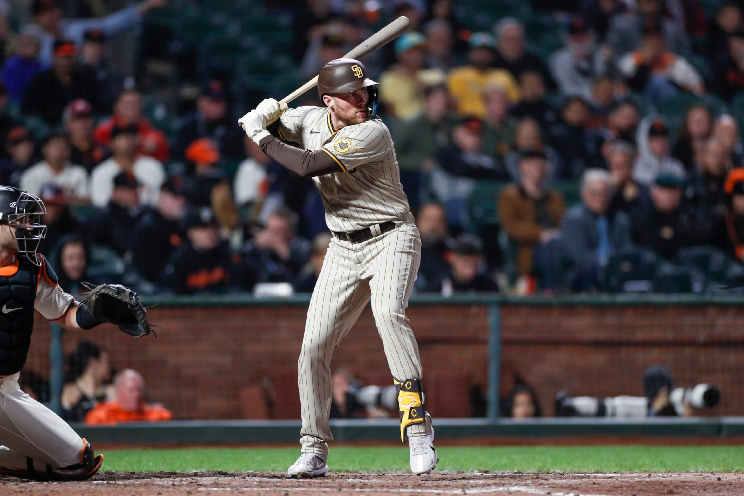 SAN FRANCISCO, CA - AUGUST 29: San Diego Padres first basemen Brandon Drury (17) waits for the pitch in the fifth inning during a game between the San Diego Padres and San Francisco Giants on August 29, 2022, at Oracle Park in San Francisco, CA. (Photo by Brandon Sloter/Icon Sportswire via Getty Images)