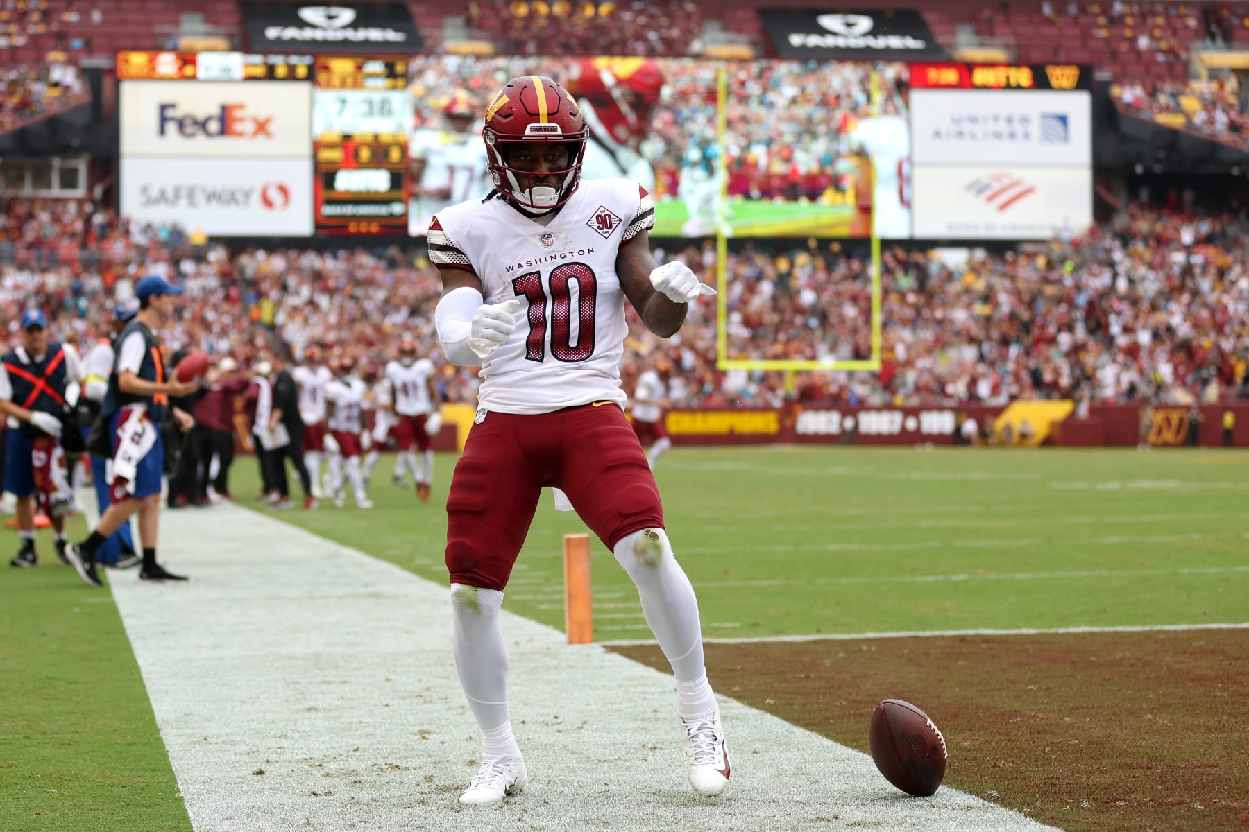 LANDOVER, MARYLAND - SEPTEMBER 11: Curtis Samuel #10 of the Washington Commanders celebrates scoring a receiving touchdown during the first quarter against the Jacksonville Jaguars at FedExField on September 11, 2022 in Landover, Maryland. (Photo by Patrick Smith/Getty Images)