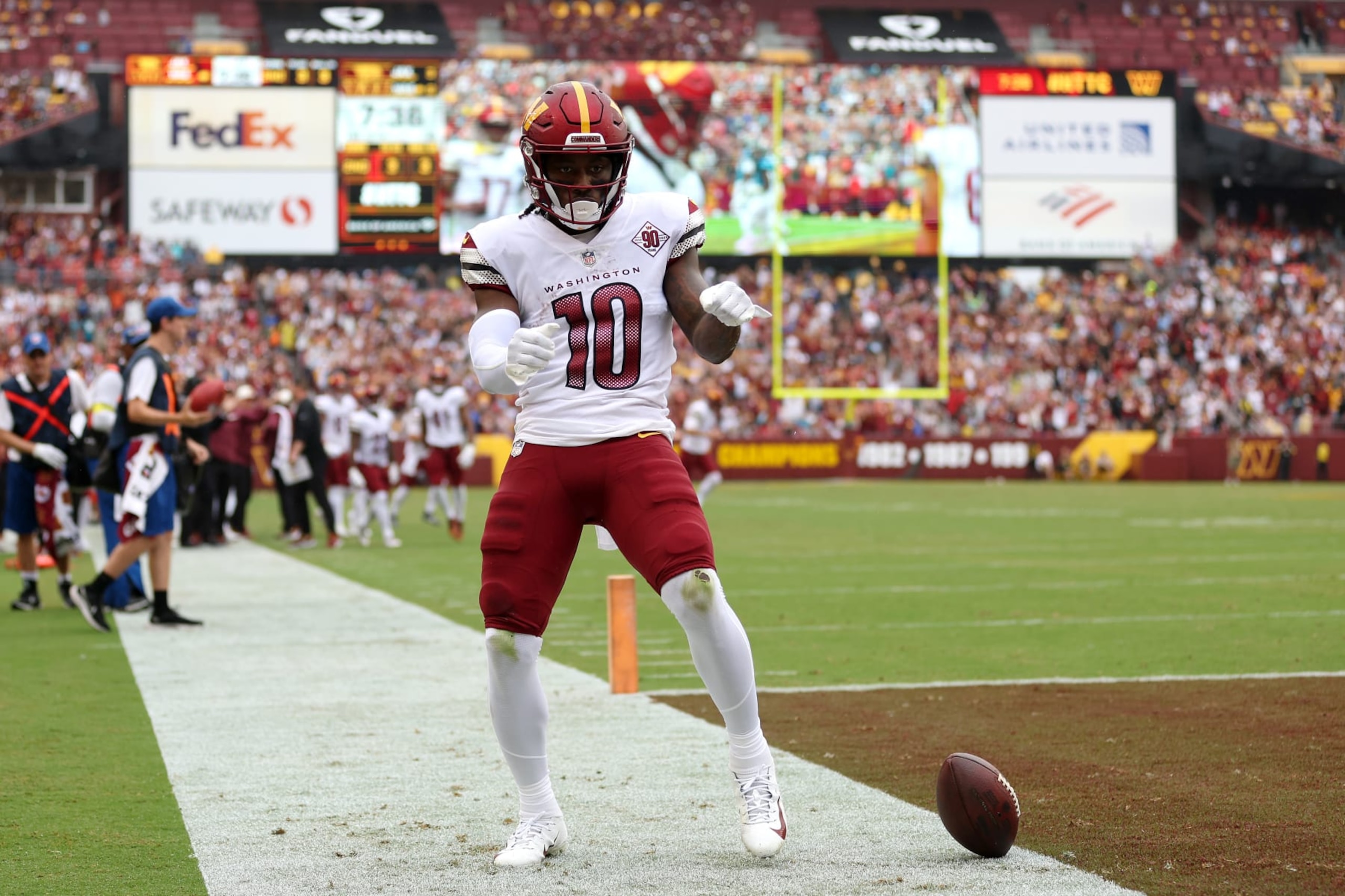LANDOVER, MARYLAND - SEPTEMBER 11: Curtis Samuel #10 of the Washington Commanders celebrates scoring a receiving touchdown during the first quarter against the Jacksonville Jaguars at FedExField on September 11, 2022 in Landover, Maryland. (Photo by Patrick Smith/Getty Images)