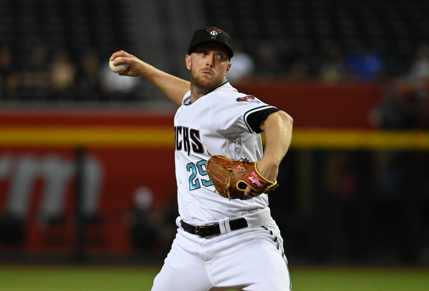 PHOENIX, ARIZONA - SEPTEMBER 01: Merrill Kelly #29 of the Arizona Diamondbacks delivers a pitch against the Milwaukee Brewers at Chase Field on September 01, 2022 in Phoenix, Arizona. (Photo by Norm Hall/Getty Images)