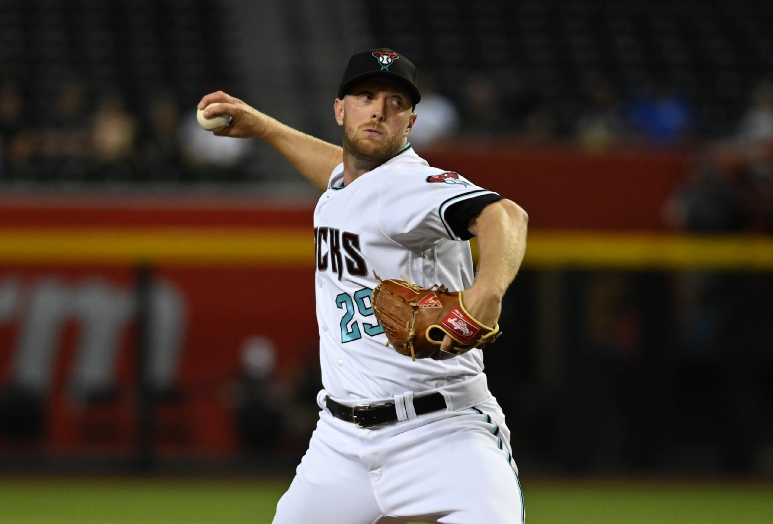 PHOENIX, ARIZONA - SEPTEMBER 01: Merrill Kelly #29 of the Arizona Diamondbacks delivers a pitch against the Milwaukee Brewers at Chase Field on September 01, 2022 in Phoenix, Arizona. (Photo by Norm Hall/Getty Images)