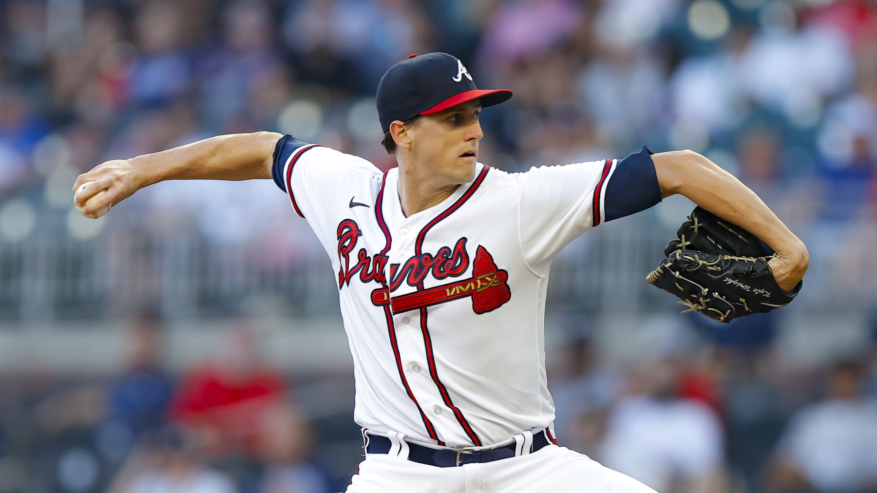 ATLANTA, GA - AUGUST 31: Kyle Wright #30 of the Atlanta Braves pitches during the first inning against the Colorado Rockies at Truist Park on August 31, 2022 in Atlanta, Georgia. (Photo by Todd Kirkland/Getty Images)