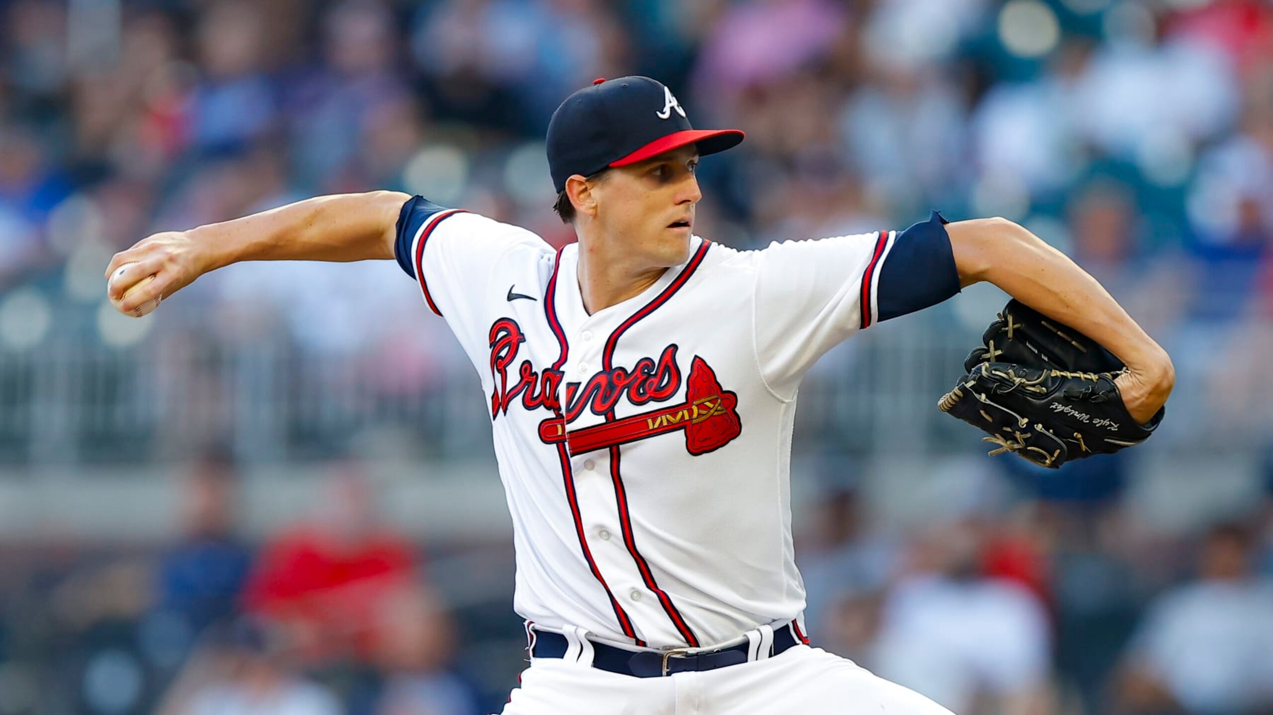 ATLANTA, GA - AUGUST 31: Kyle Wright #30 of the Atlanta Braves pitches during the first inning against the Colorado Rockies at Truist Park on August 31, 2022 in Atlanta, Georgia. (Photo by Todd Kirkland/Getty Images)