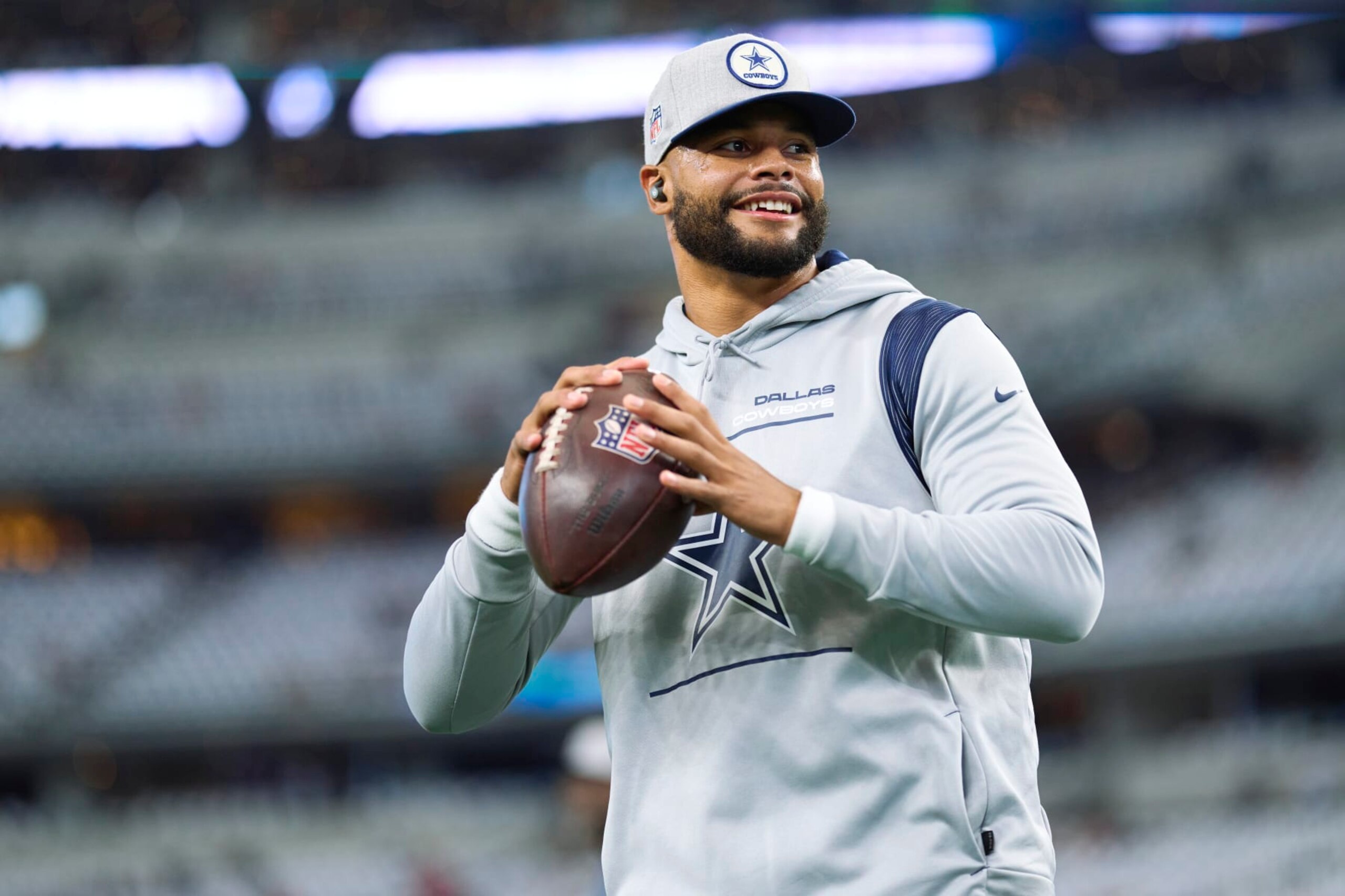 ARLINGTON, TX - SEPTEMBER 11: Dak Prescott #4 of the Dallas Cowboys warms up before kickoff against the Tampa Bay Buccaneers at AT&T Stadium on September 11, 2022 in Arlington, TX. (Photo by Cooper Neill/Getty Images)