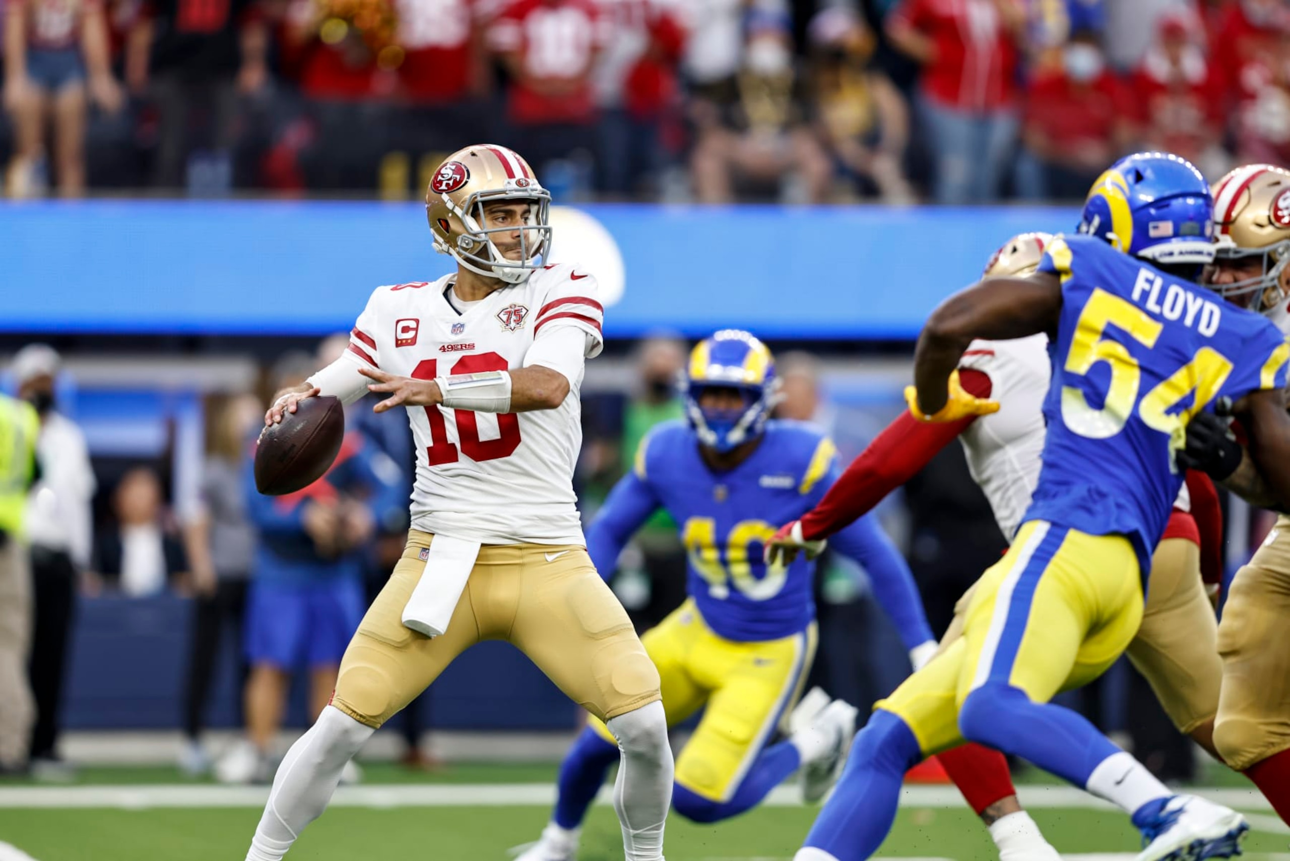 INGLEWOOD, CALIFORNIA - JANUARY 30: Jimmy Garoppolo #10 of the San Francisco 49ers looks to pass during the NFC Championship NFL football game against the Los Angeles Rams at SoFi Stadium on January 30, 2022 in Inglewood, California. The Rams won 20-17 to advance to the Super Bowl. (Photo by Michael Owens/Getty Images)