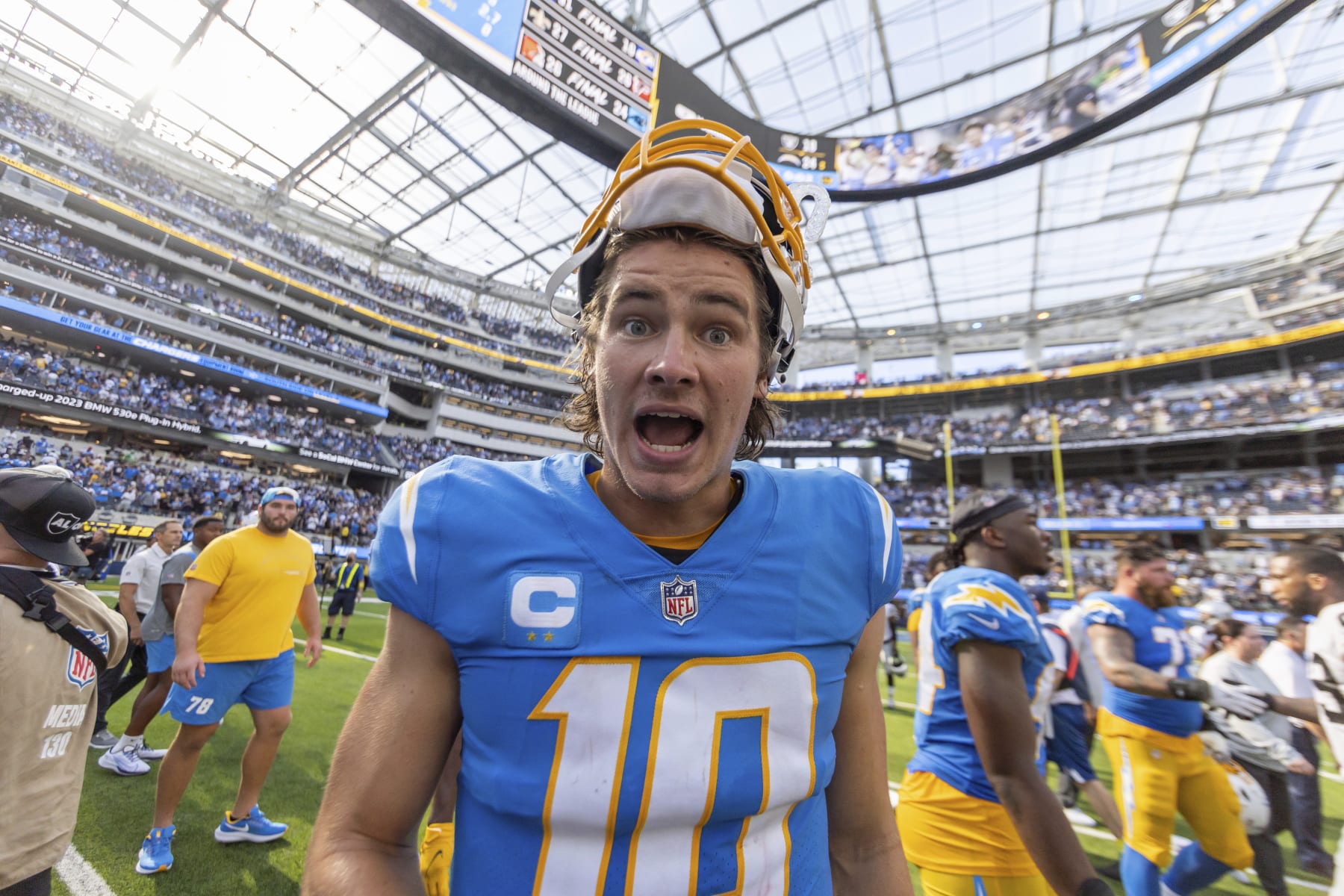 Quarterback (10) Justin Herbert of the Los Angeles Chargers after the Chargers defeat the Raiders 24-19 in an NFL football game, Sunday, Sept. 11, 2022, in Inglewood, Calif. (AP Photo/Jeff Lewis)