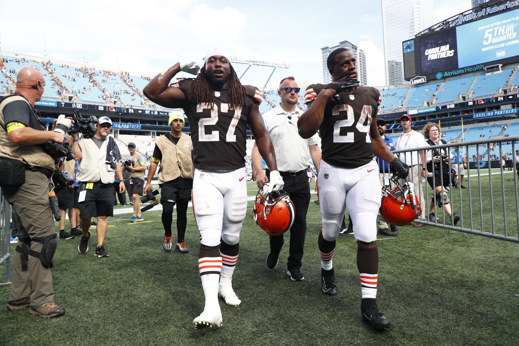 CHARLOTTE, NORTH CAROLINA - SEPTEMBER 11: Kareem Hunt #27 of the Cleveland Browns and Nick Chubb #24 leave the field after defeating the Carolina Panthers at Bank of America Stadium on September 11, 2022 in Charlotte, North Carolina. (Photo by Jared C. Tilton/Getty Images)