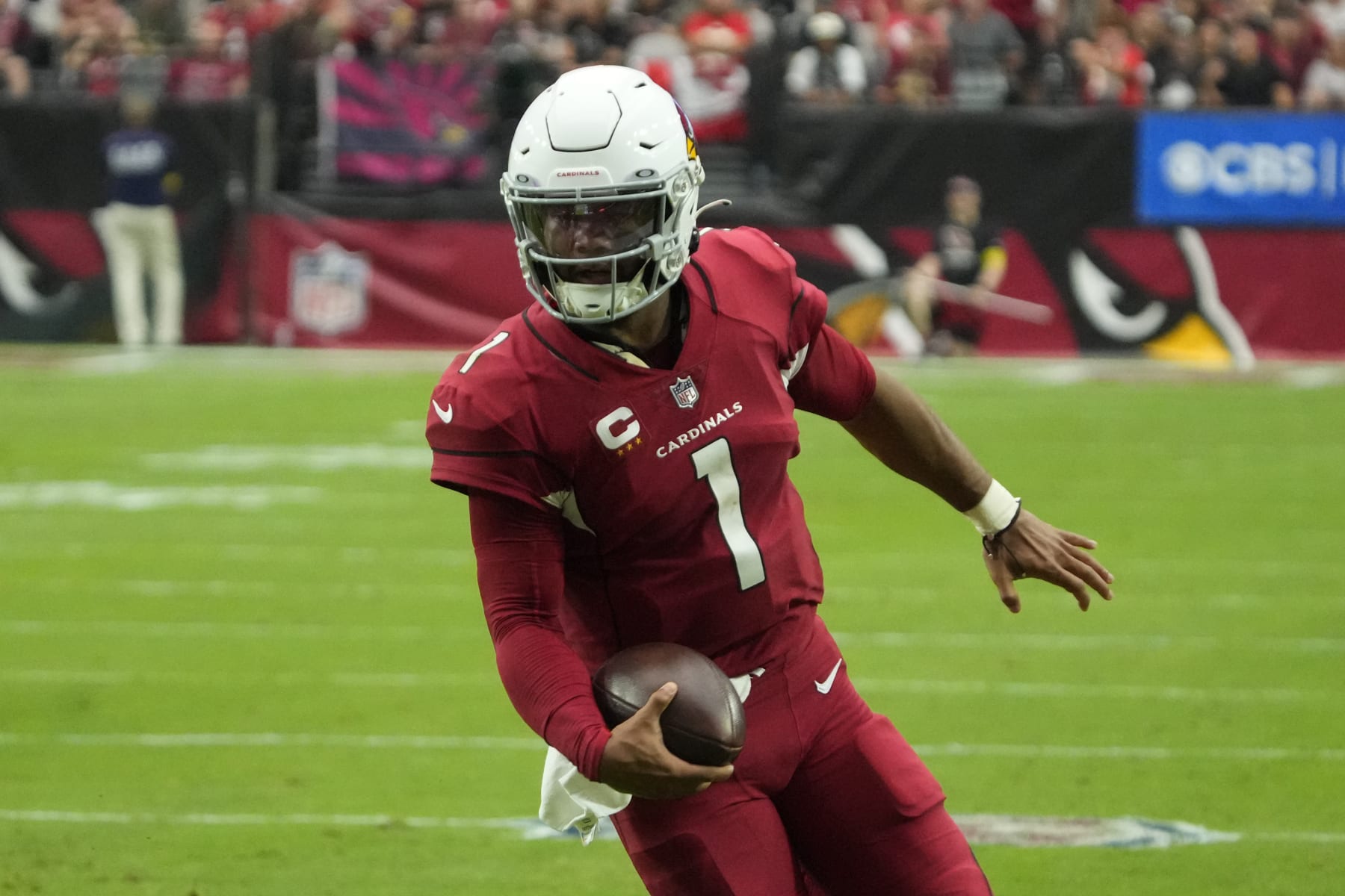 Arizona Cardinals quarterback Kyler Murray (1) runs the ball during the first half of an NFL football game against the Kansas City Chiefs, Sunday, Sept. 11, 2022, in Glendale, Ariz. (AP Photo/Rick Scuteri)