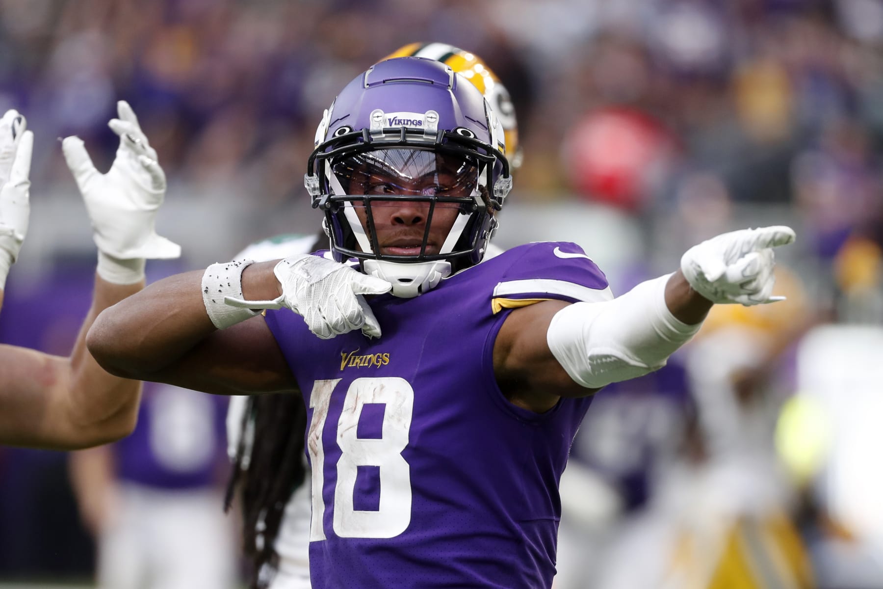 Minnesota Vikings wide receiver Justin Jefferson (18) celebrates after catching a pass for a first down during the second half of an NFL football game against the Green Bay Packers, Sunday, Sept. 11, 2022, in Minneapolis. (AP Photo/Bruce Kluckhohn)