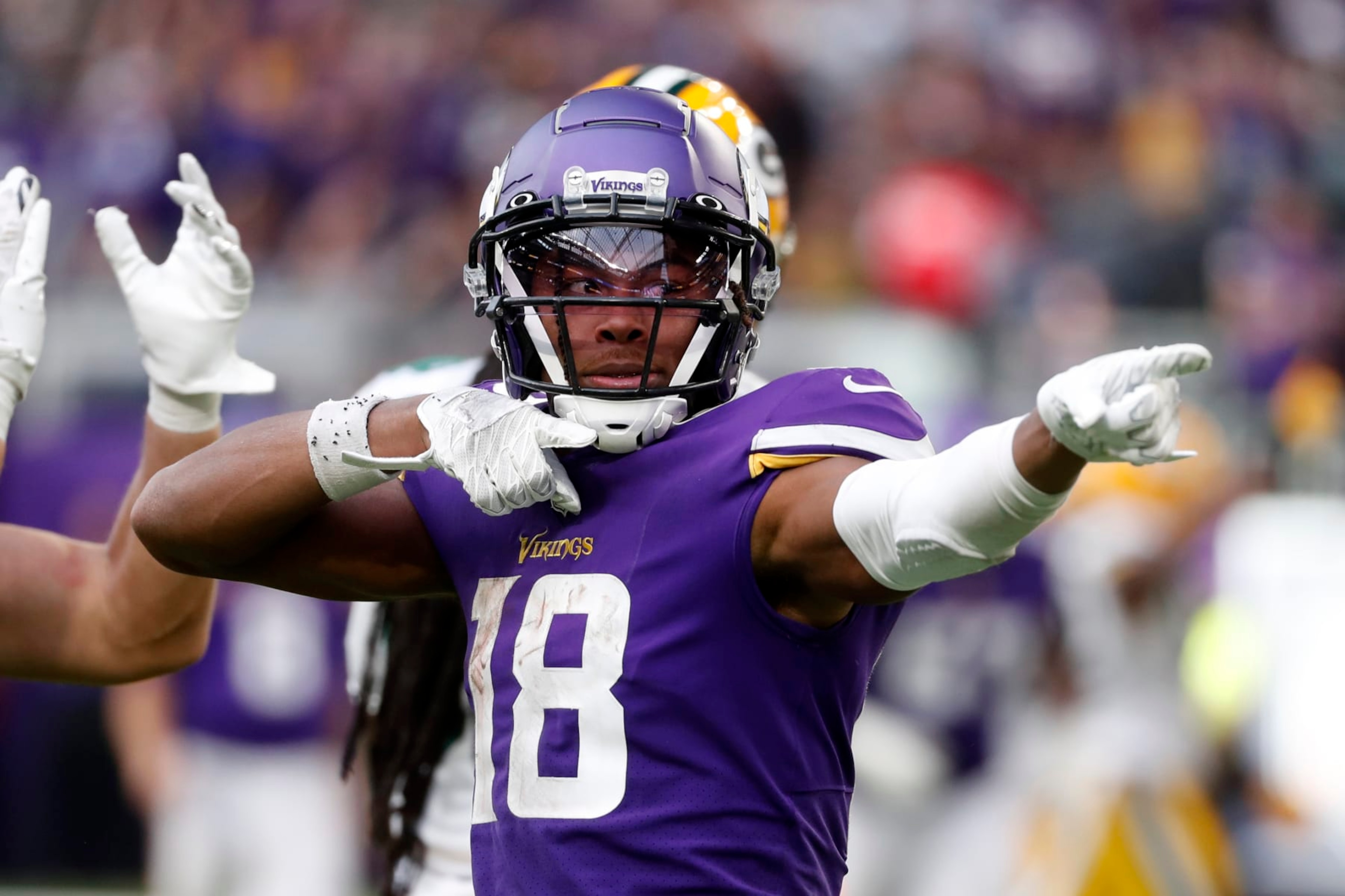 Minnesota Vikings wide receiver Justin Jefferson (18) celebrates after catching a pass for a first down during the second half of an NFL football game against the Green Bay Packers, Sunday, Sept. 11, 2022, in Minneapolis. (AP Photo/Bruce Kluckhohn)