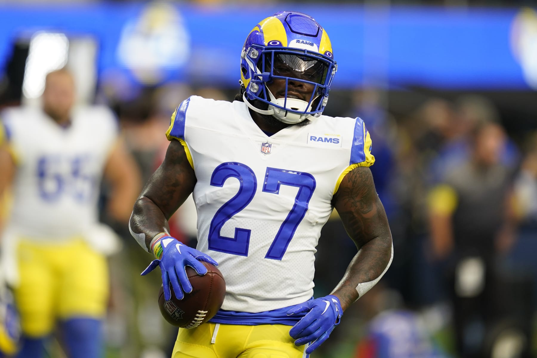 Los Angeles Rams running back Darrell Henderson Jr. (27) warms up before an NFL football game against the Buffalo Bills Friday, Sept. 9, 2022, in Inglewood, Calif. (AP Photo/Ashley Landis)