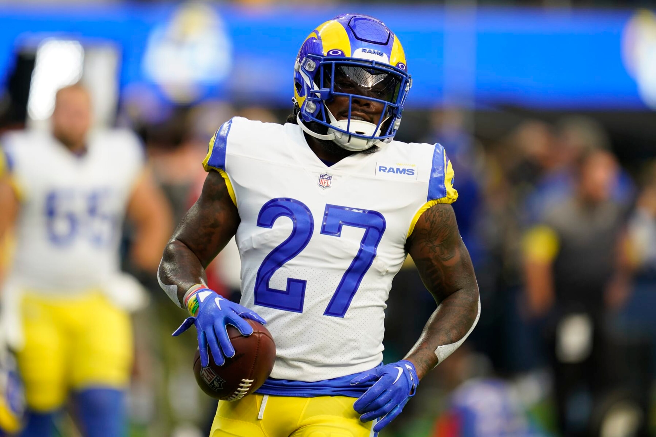 Los Angeles Rams running back Darrell Henderson Jr. (27) warms up before an NFL football game against the Buffalo Bills Friday, Sept. 9, 2022, in Inglewood, Calif. (AP Photo/Ashley Landis)