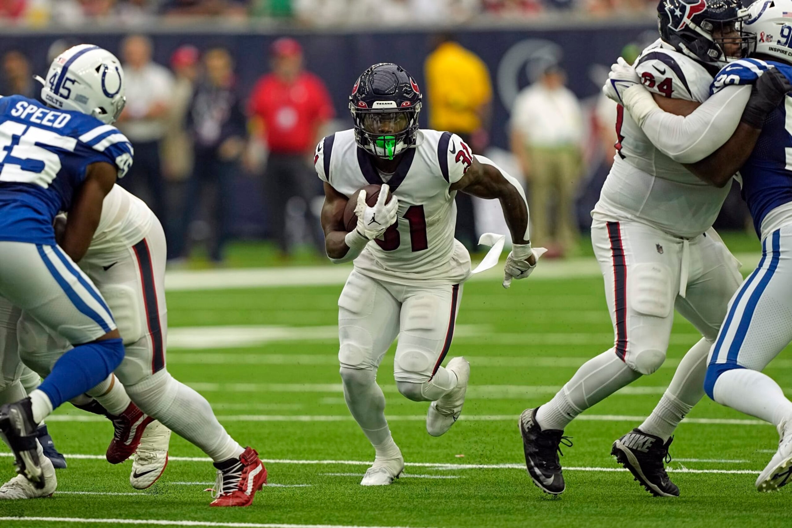 Houston Texans running back Dameon Pierce (31) rushes for a gain against the Indianapolis Colts during the second half of an NFL football game Sunday, Sept. 11, 2022, in Houston. (AP Photo/David J. Phillip)