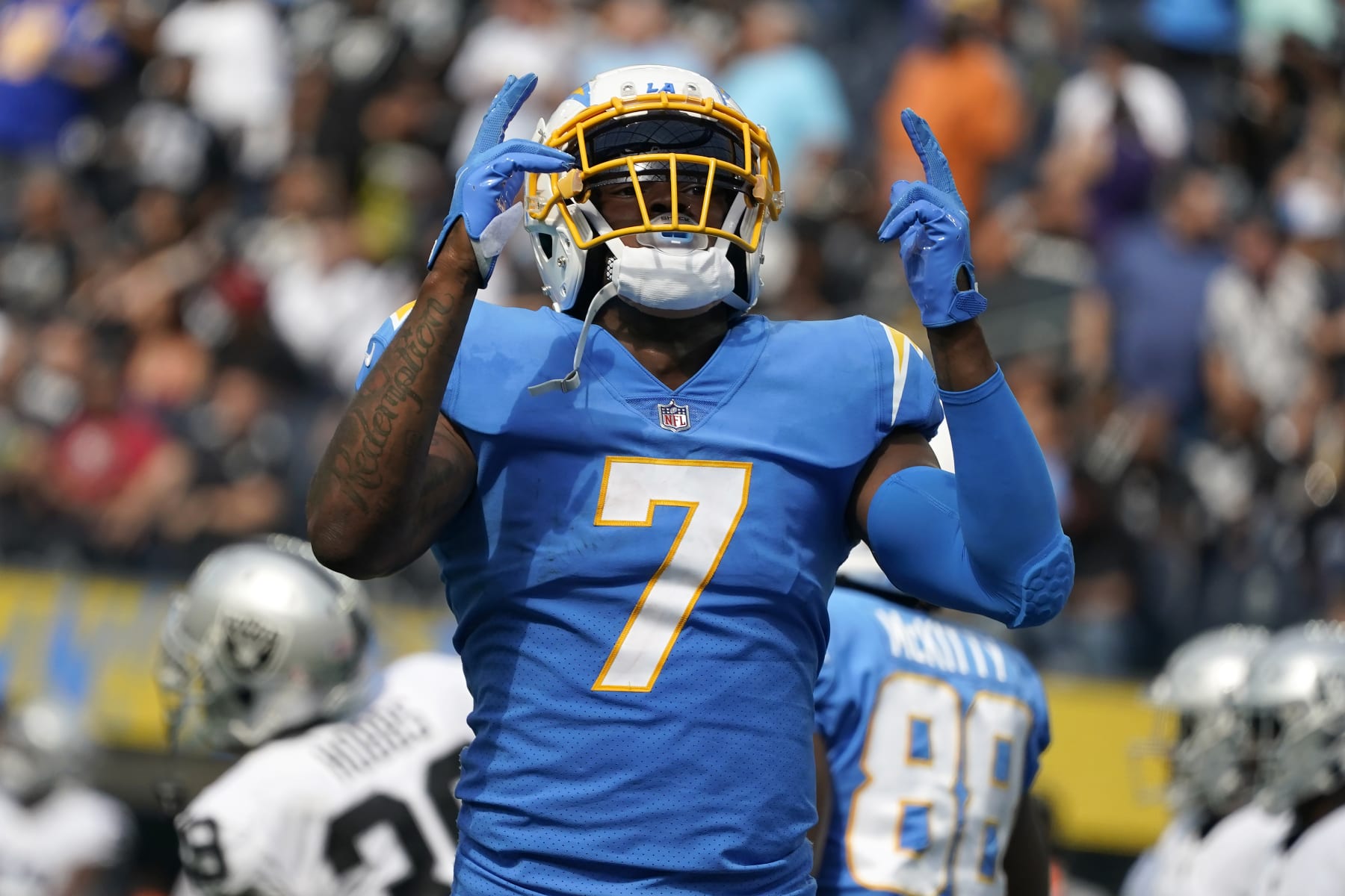 Los Angeles Chargers tight end Gerald Everett (7) celebrates after scoring against the Las Vegas Raiders during the second half of an NFL football game in Inglewood, Calif., Sunday, Sept. 11, 2022. (AP Photo/Marcio Jose Sanchez)