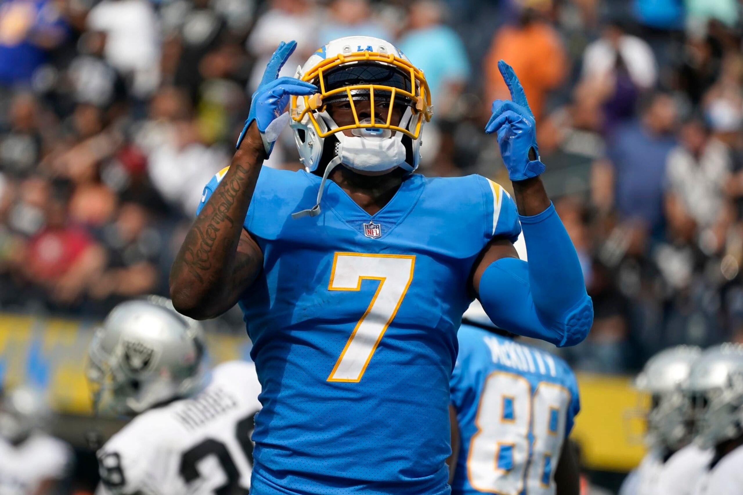 Los Angeles Chargers tight end Gerald Everett (7) celebrates after scoring against the Las Vegas Raiders during the second half of an NFL football game in Inglewood, Calif., Sunday, Sept. 11, 2022. (AP Photo/Marcio Jose Sanchez)