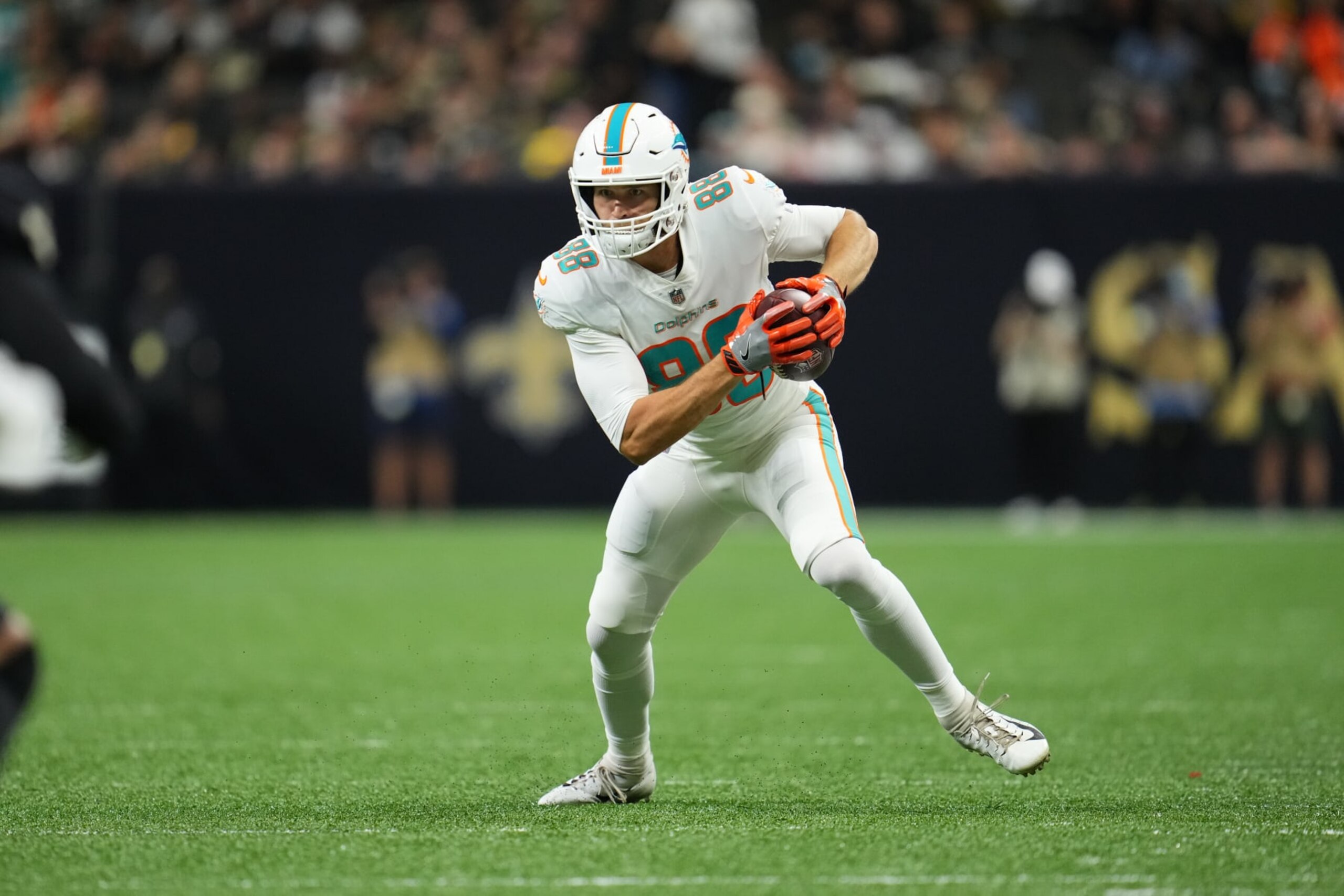 NEW ORLEANS, LOUISIANA - DECEMBER 27: Mike Gesicki #88 of the Miami Dolphins runs the ball during an NFL game against the New Orleans Saints at Caesars Superdome on December 27, 2021 in New Orleans, Louisiana. (Photo by Cooper Neill/Getty Images)