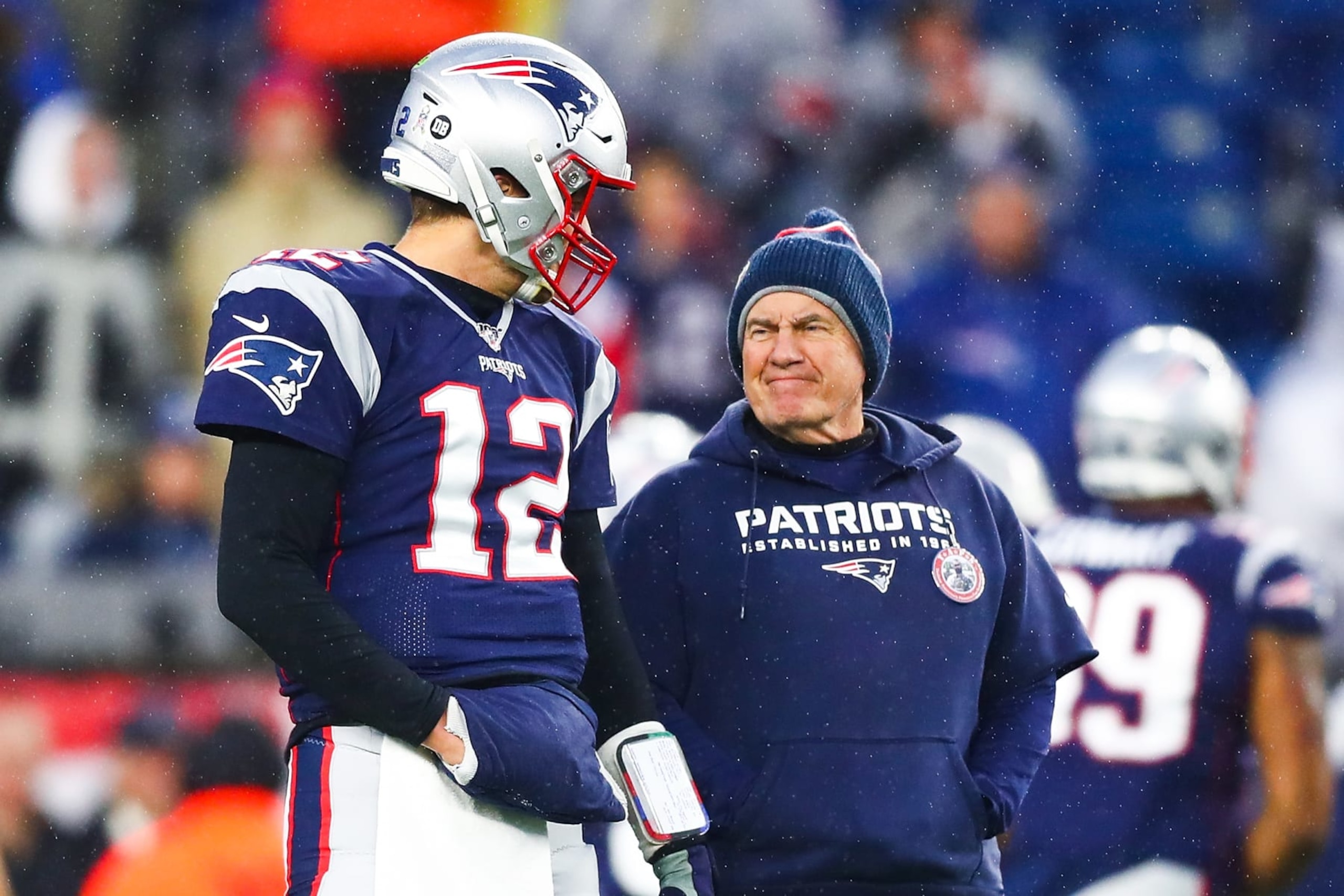 FOXBOROUGH, MA - NOVEMBER 24: Tom Brady #12 talks to head coach Bill Belichick of the New England Patriots before a game against the Dallas Cowboys at Gillette Stadium on November 24, 2019 in Foxborough, Massachusetts. (Photo by Adam Glanzman/Getty Images) FOXBOROUGH, MA - NOVEMBER 24: Tom Brady #12 talks to head coach Bill Belichick of the New England Patriots before a game against the Dallas Cowboys at Gillette Stadium on November 24, 2019 in Foxborough, Massachusetts. (Photo by Adam Glanzman/Getty Images)
