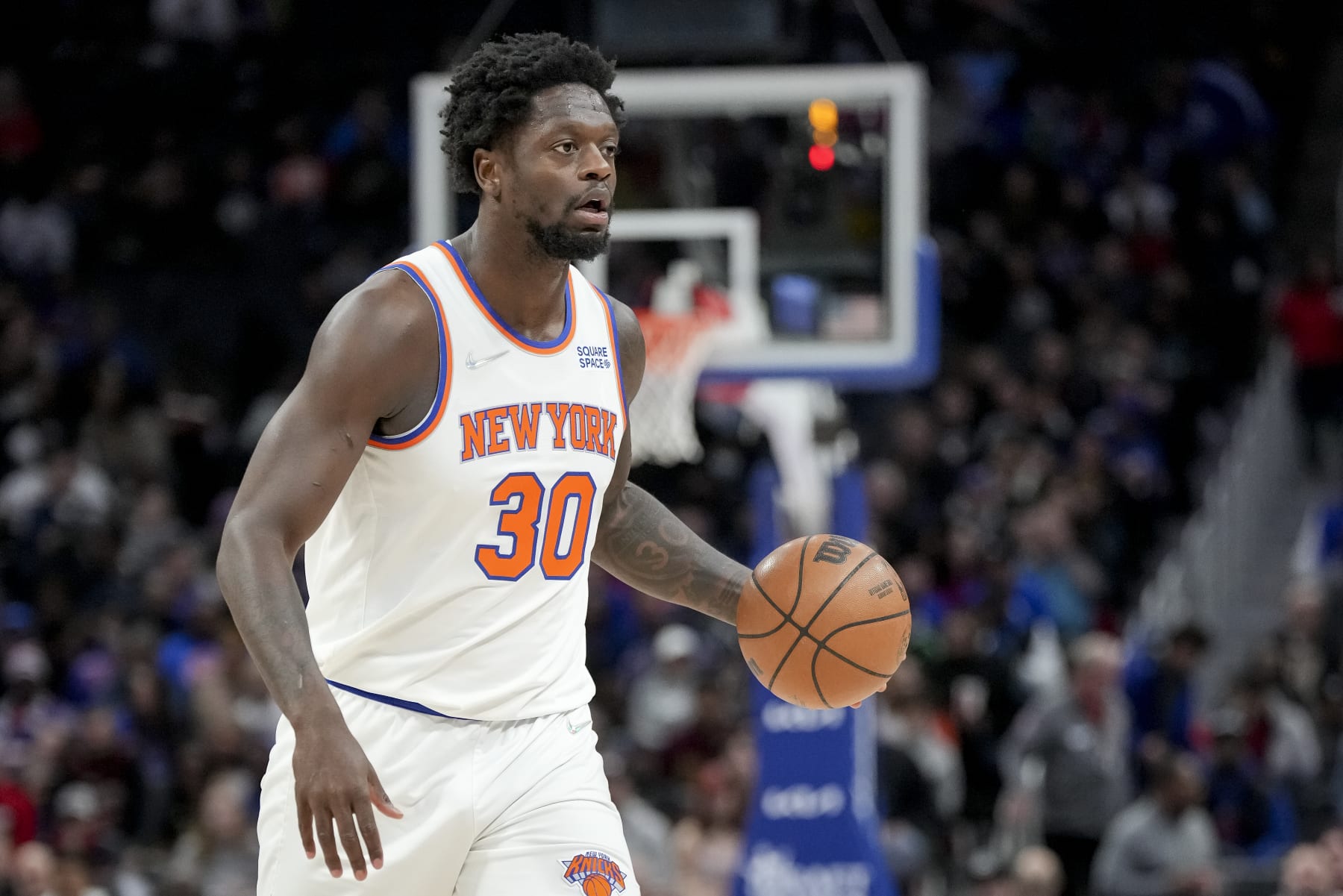 DETROIT, MICHIGAN - MARCH 27: Julius Randle #30 of the New York Knicks handles the ball against the Detroit Pistons during the first quarter at Little Caesars Arena on March 27, 2022 in Detroit, Michigan. NOTE TO USER: User expressly acknowledges and agrees that, by downloading and or using this photograph, User is consenting to the terms and conditions of the Getty Images License Agreement. (Photo by Nic Antaya/Getty Images)