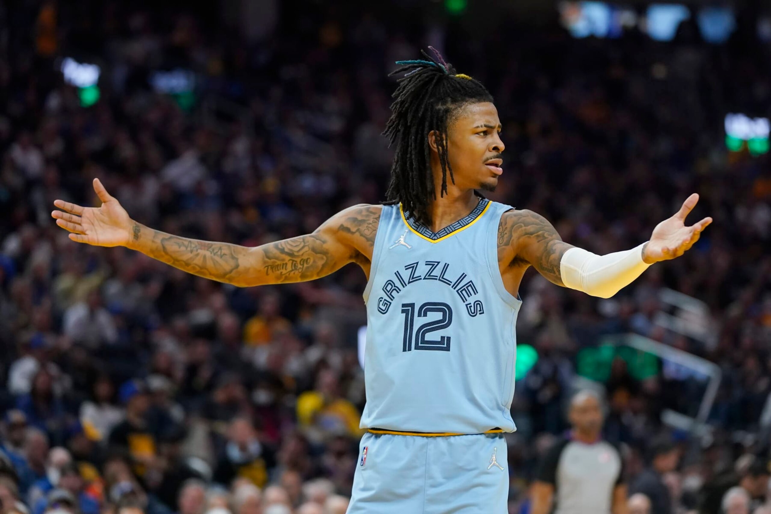Memphis Grizzlies guard Ja Morant (12) reacts to an official's call during the second half of Game 3 of the team's NBA basketball Western Conference playoff semifinal against the Golden State Warriors in San Francisco, Saturday, May 7, 2022. (AP Photo/Jeff Chiu) Memphis Grizzlies guard Ja Morant (12) reacts to an official's call during the second half of Game 3 of the team's NBA basketball Western Conference playoff semifinal against the Golden State Warriors in San Francisco, Saturday, May 7, 2022. (AP Photo/Jeff Chiu)