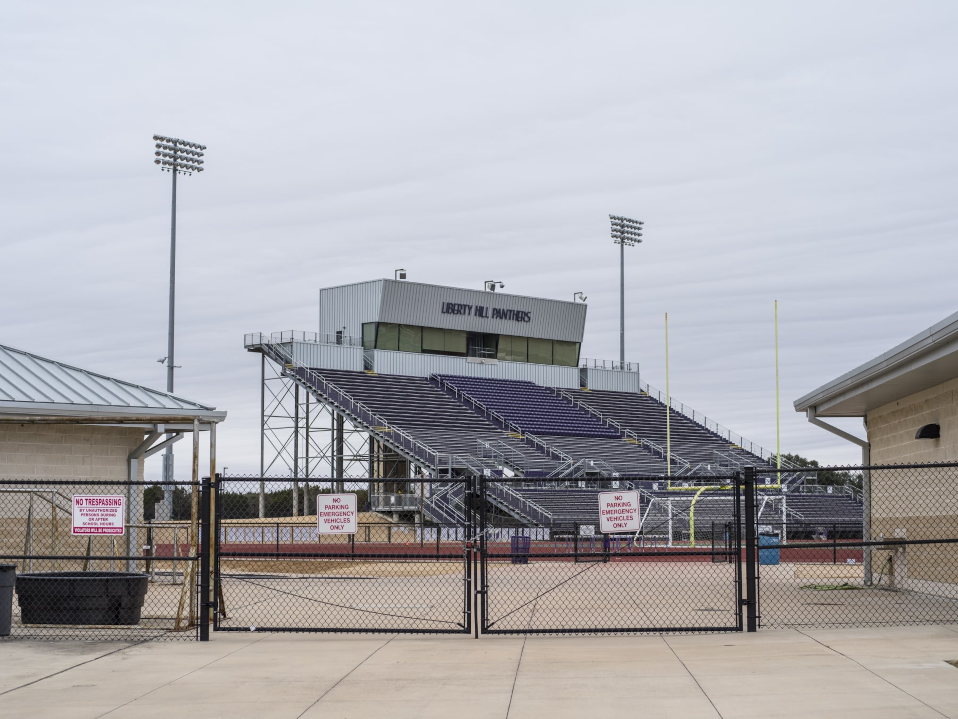 An empty football field at Liberty Hill Independent School District high school while temporarily closed due to staff shortages in Liberty Hill, Texas, U.S., on Thursday, Jan. 20, 2022. Some Central Texas school districts were forced to close all campuses on Thursday and Friday due to staff shortages cause by Covid-19, reported NBC-affiliated KXAN-TV. Photographer: Matthew Busch/Bloomberg via Getty Images
